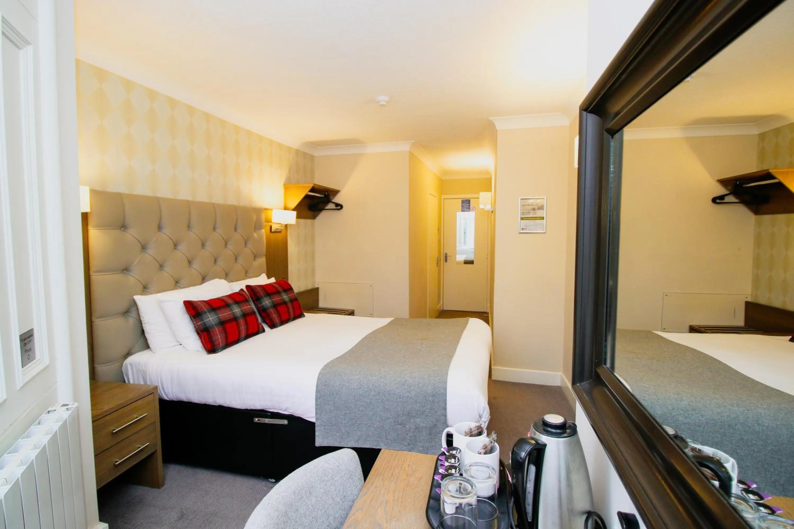 Bed in Ambassador Hotel