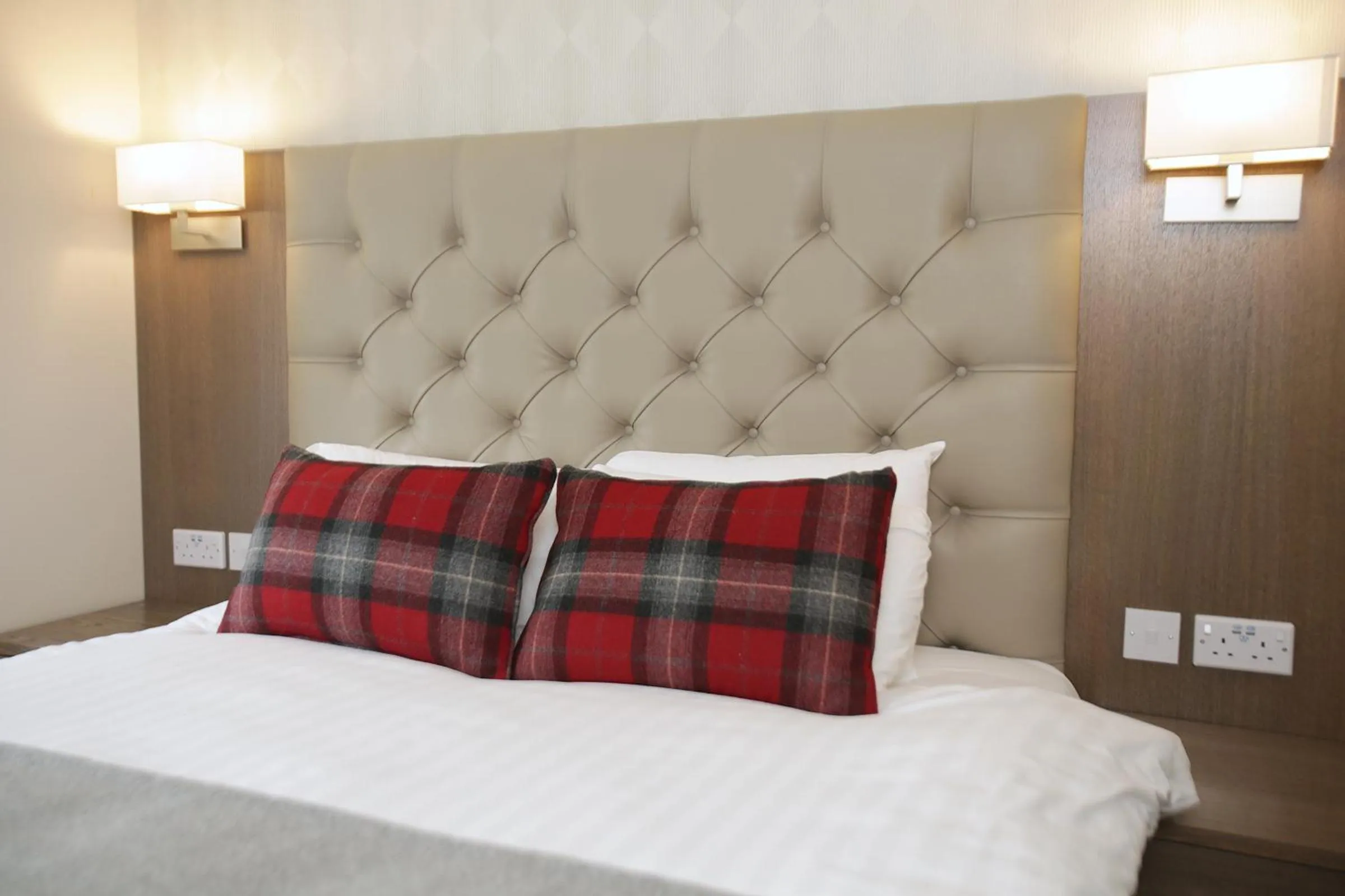 Bed in Ambassador Hotel