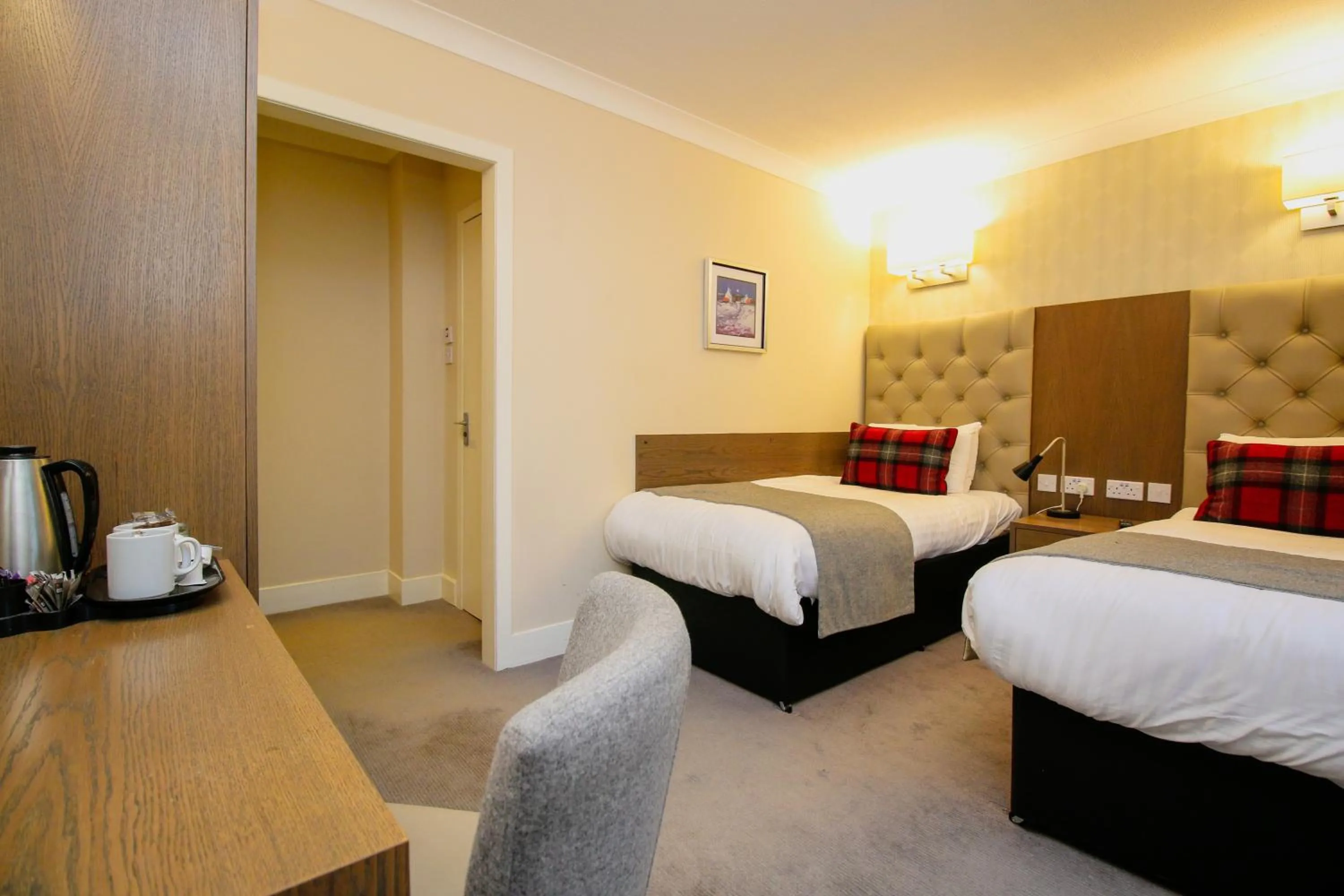 Bed in Ambassador Hotel