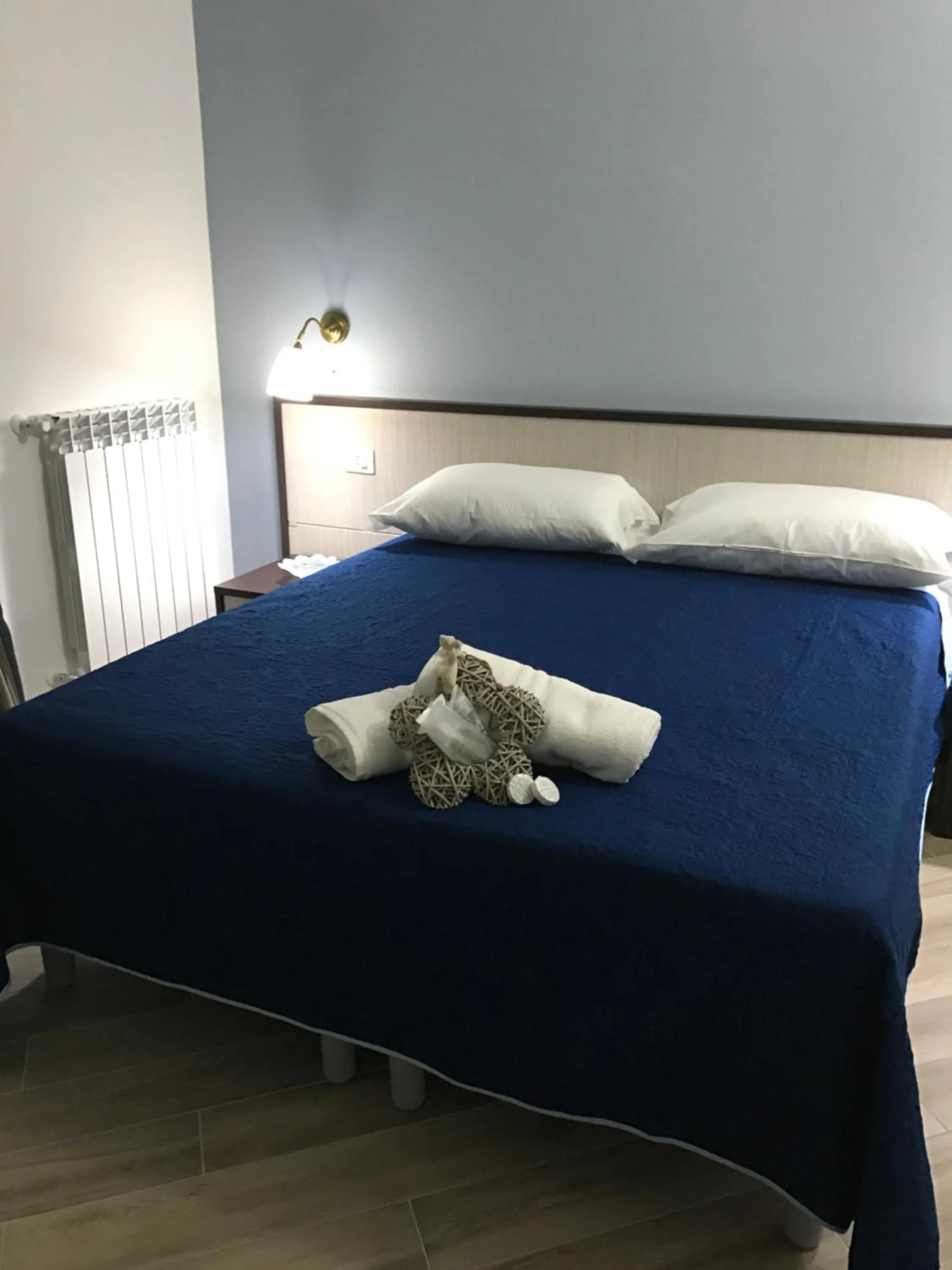 Photo of the whole room, Bed in Residenza Murat