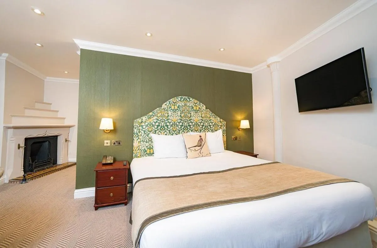 Bed in The Elvetham Hotel