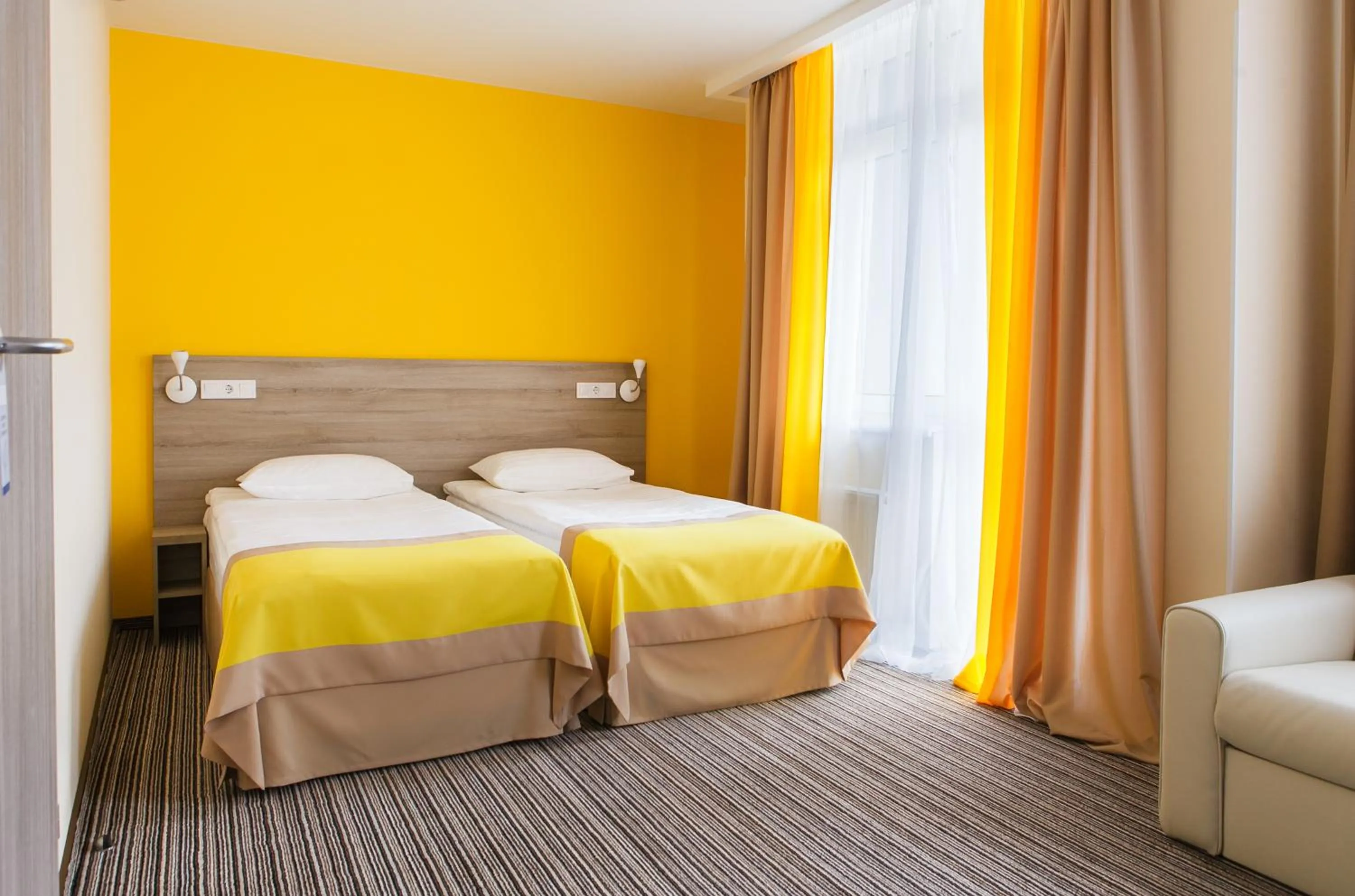 Bed in Raziotel Kyiv Yamska