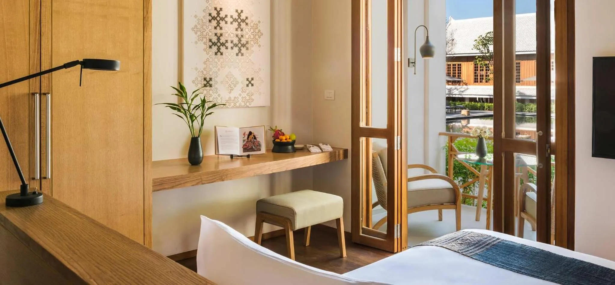 Bed in Avani+ Luang Prabang Hotel