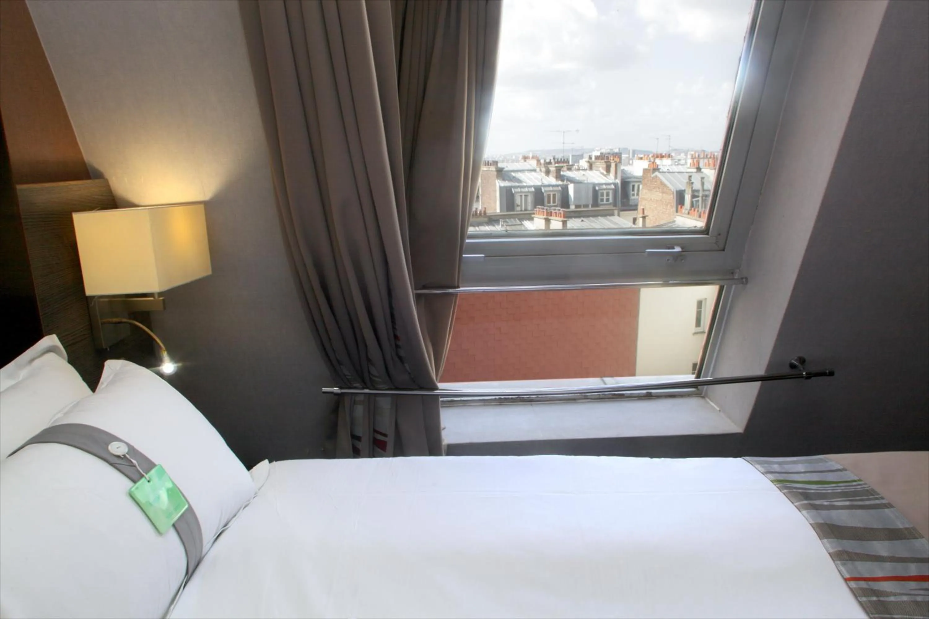 Photo of the whole room, Bed in Holiday Inn Paris Montmartre by IHG