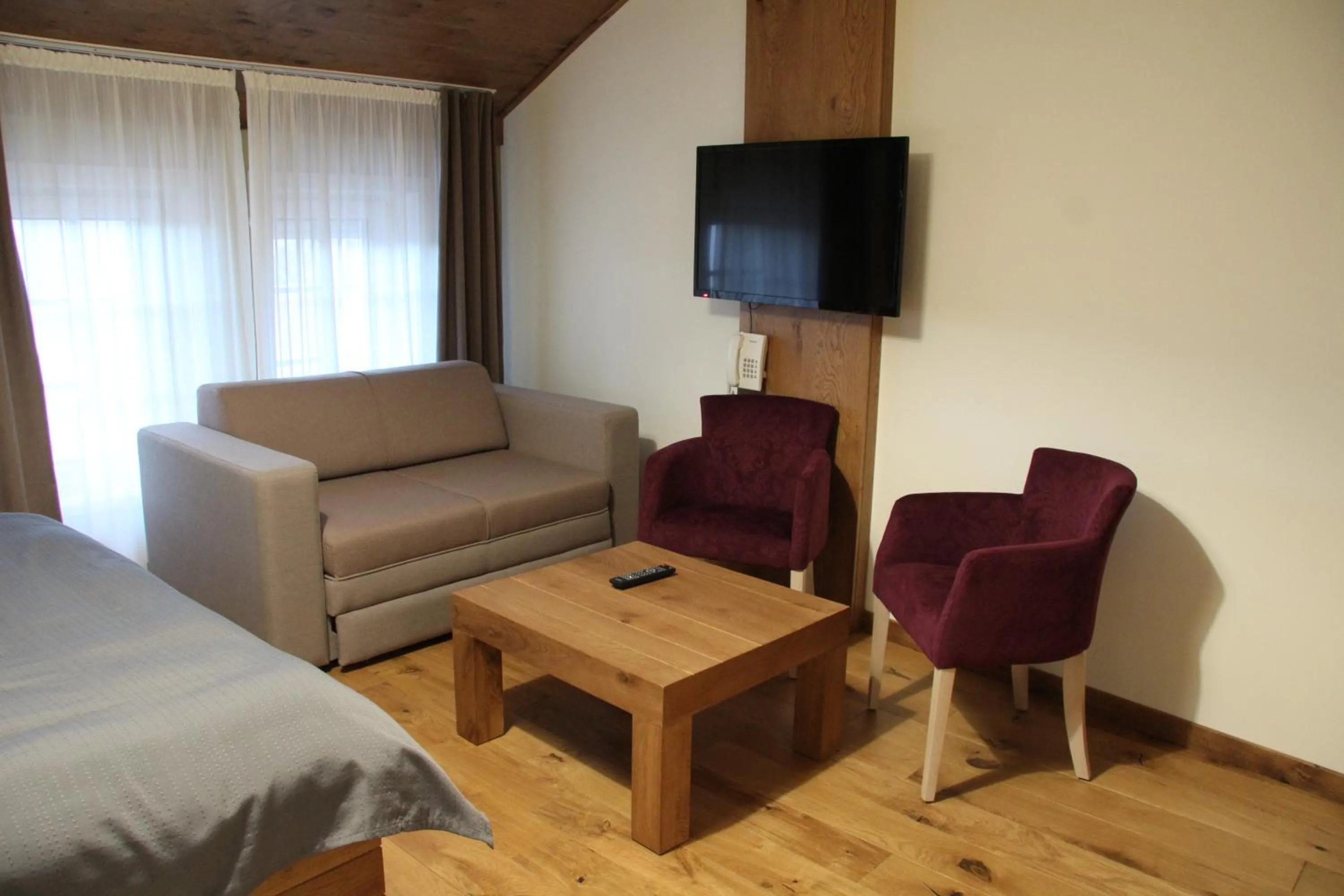 TV and multimedia, Bed in B&B Villa Panuka