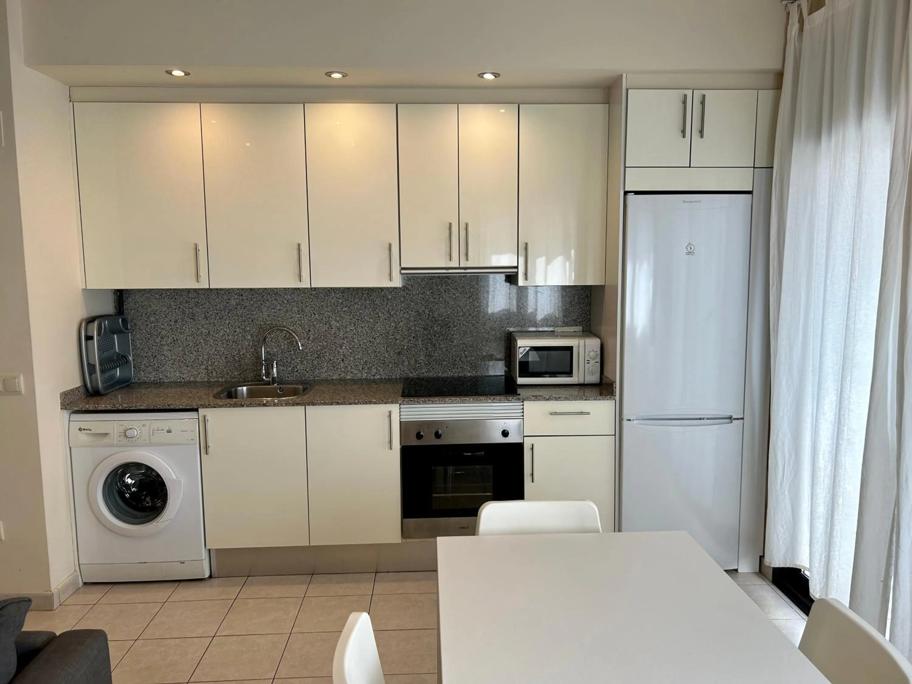 Kitchen or kitchenette in Apartamentos TDM