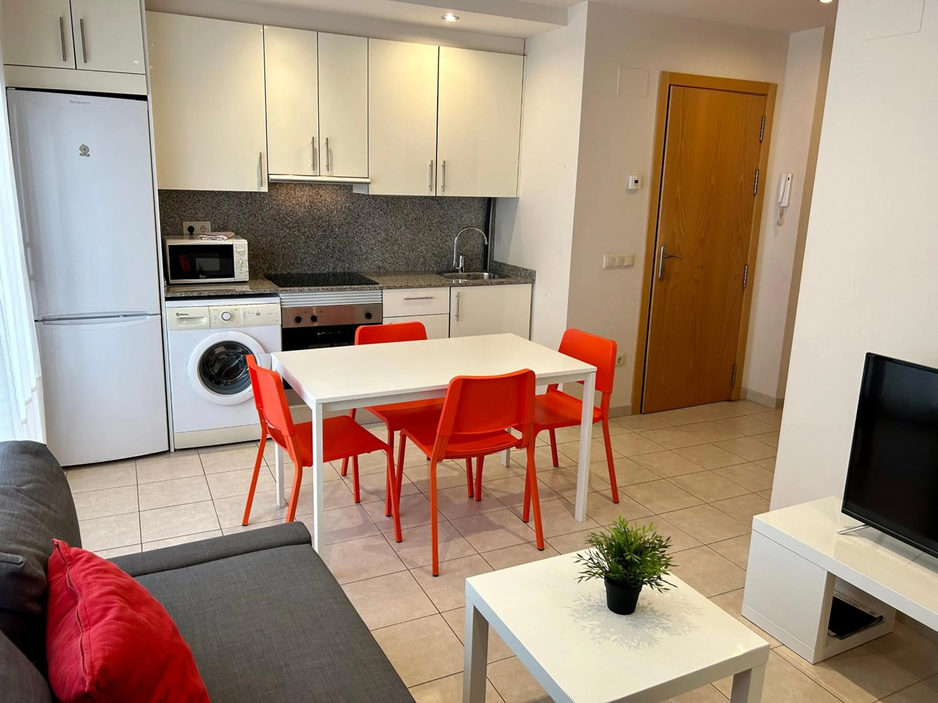 Kitchen or kitchenette in Apartamentos TDM