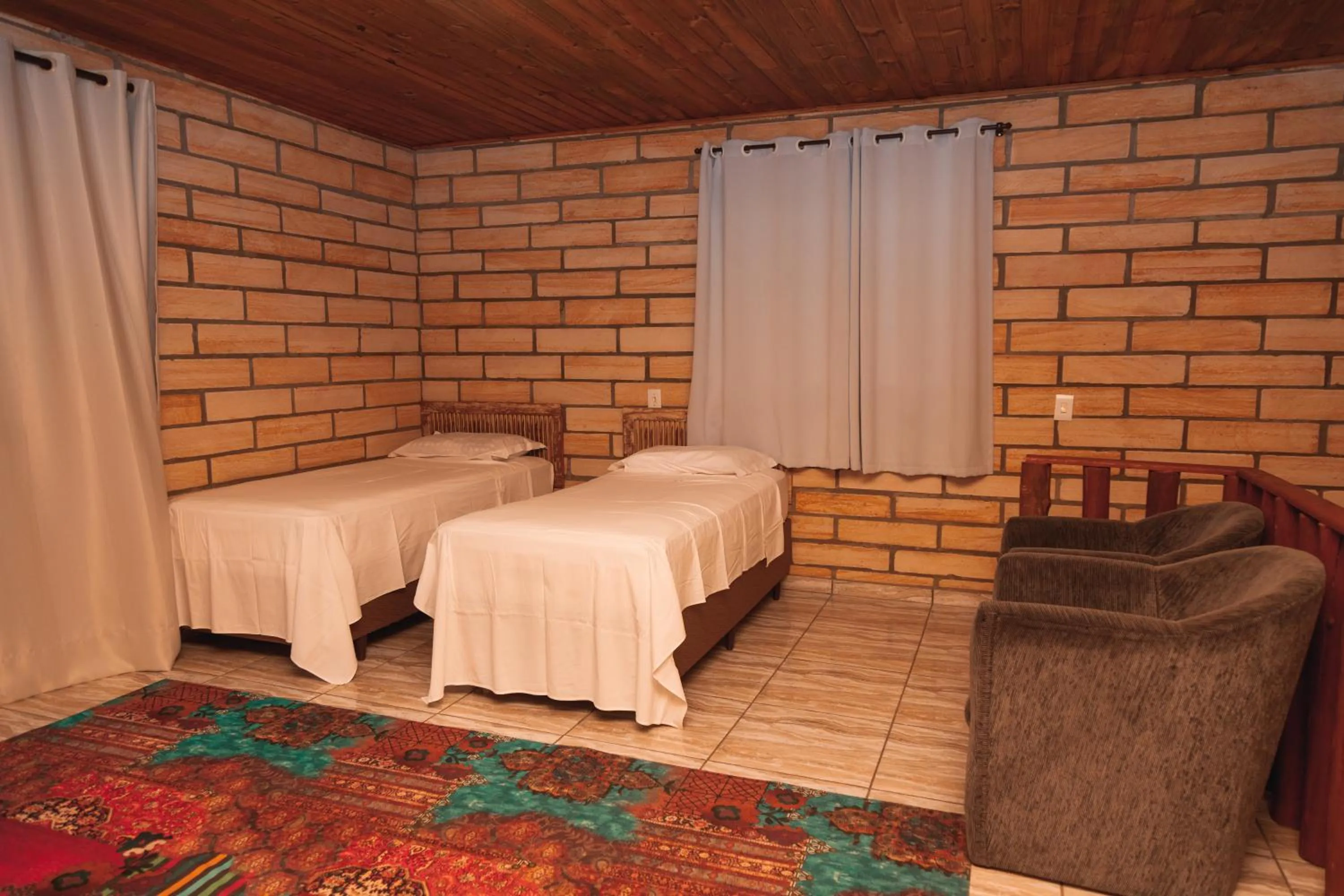 Bed in Pousada Água dos Canyons