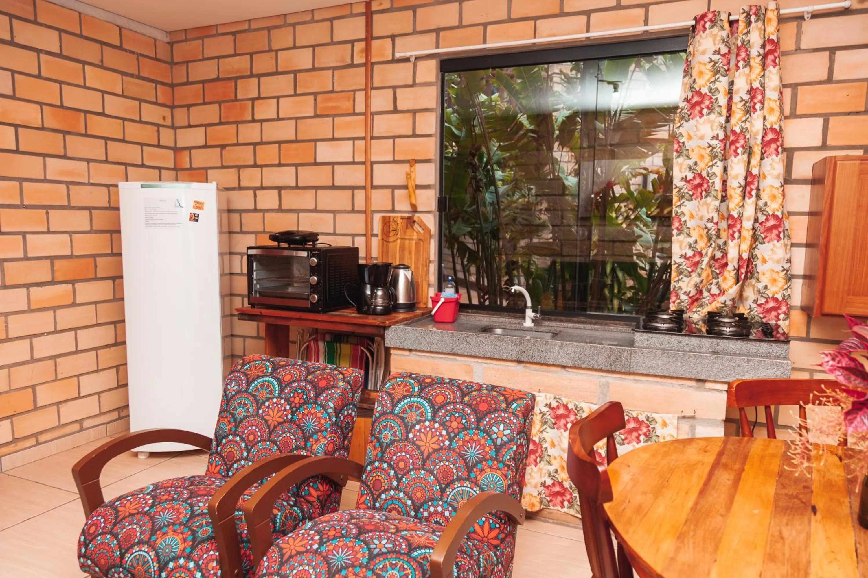 Kitchen or kitchenette in Pousada Água dos Canyons