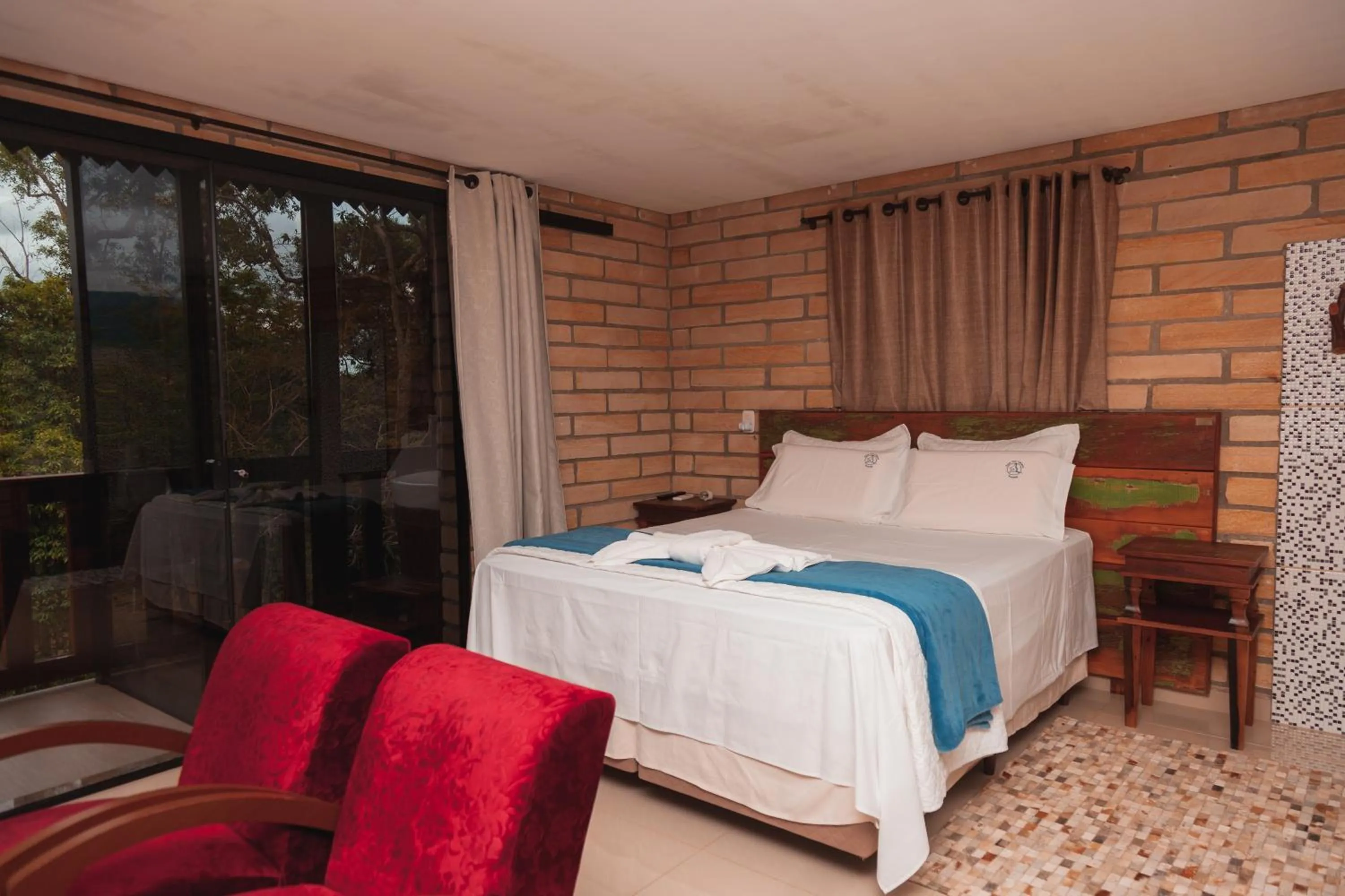 Bed in Pousada Água dos Canyons