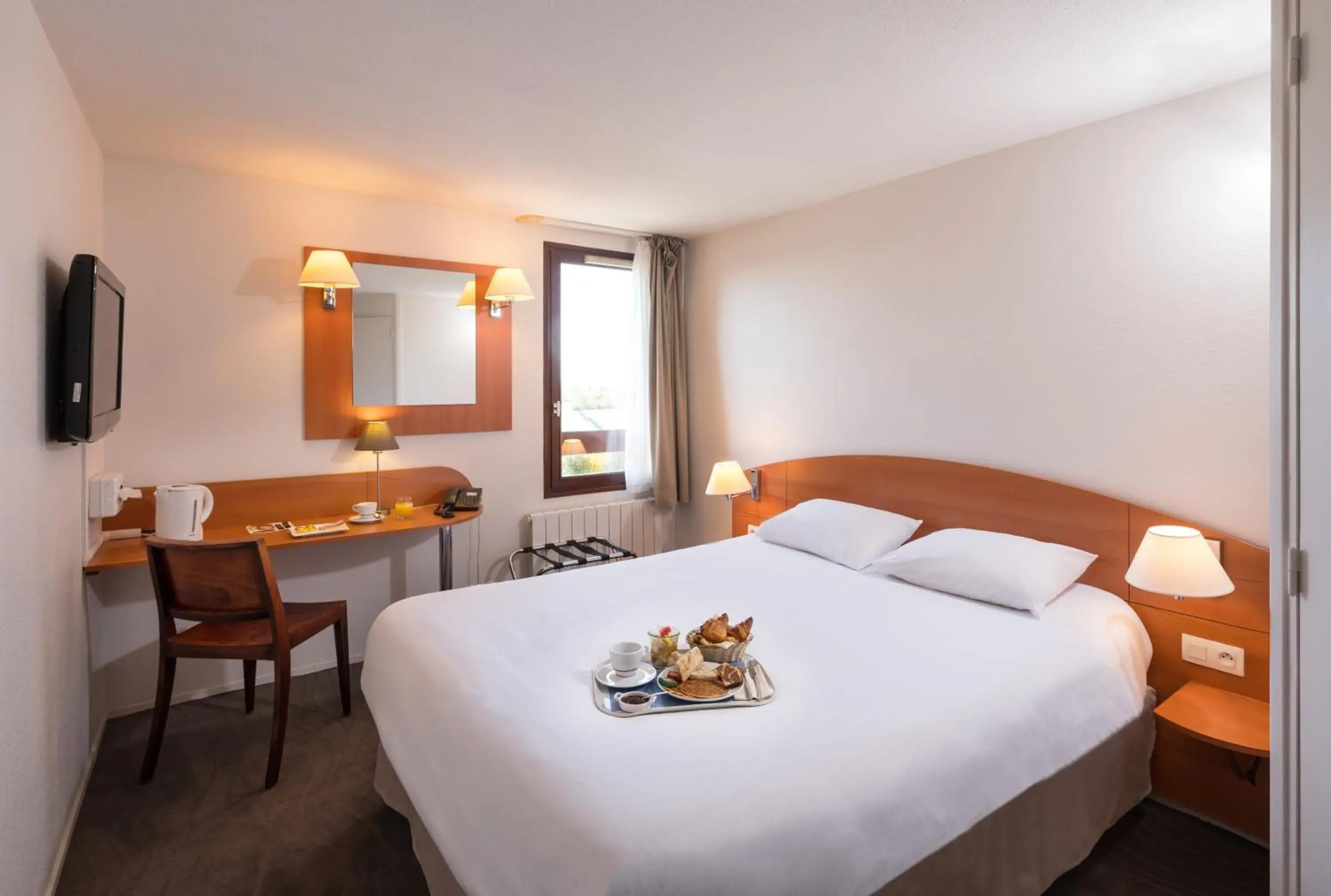 Bed in Kyriad Caen Sud Bed in Kyriad Caen Sud