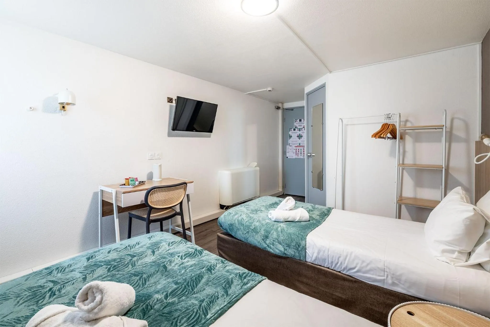 Photo of the whole room, Bed in Hôtel Le Roxane