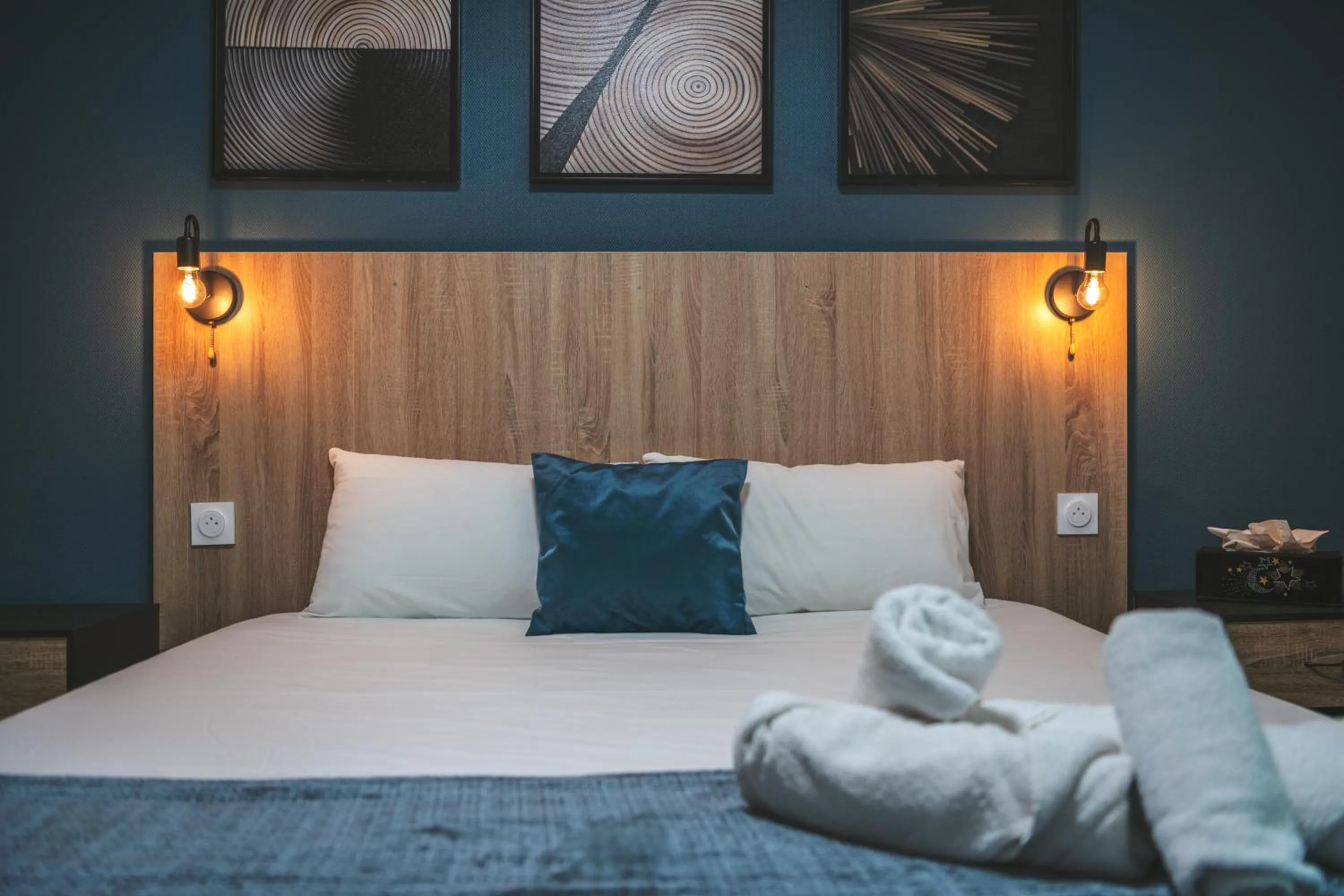 Bed in Hôtel Le Roxane