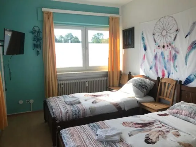 Photo of the whole room, Bed in Die Werkstatt