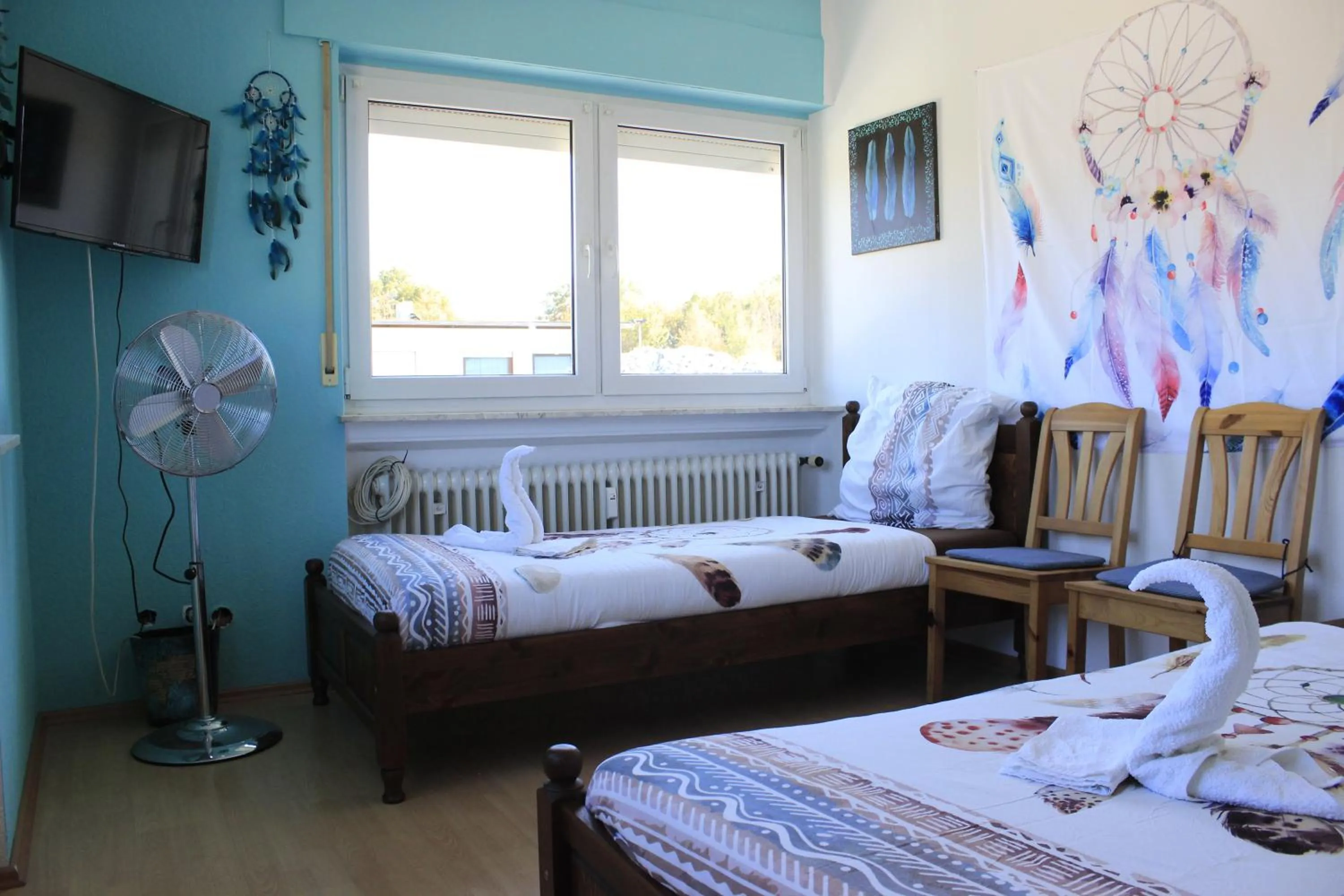 Photo of the whole room, Bed in Die Werkstatt