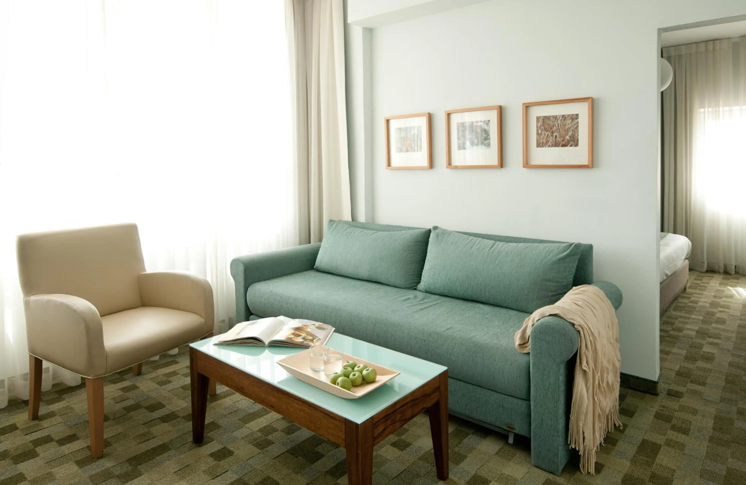 Seating area in Prima Galil Tiberias Hotel