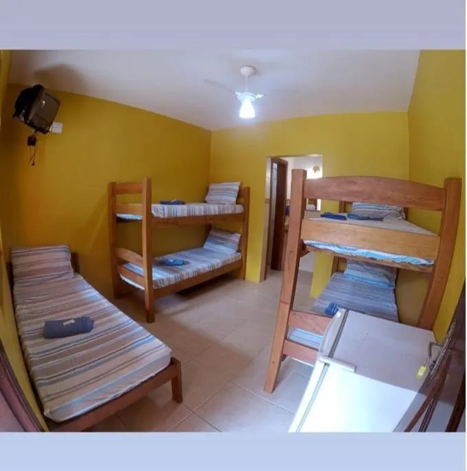 Bed in Pousada Baleia Franca