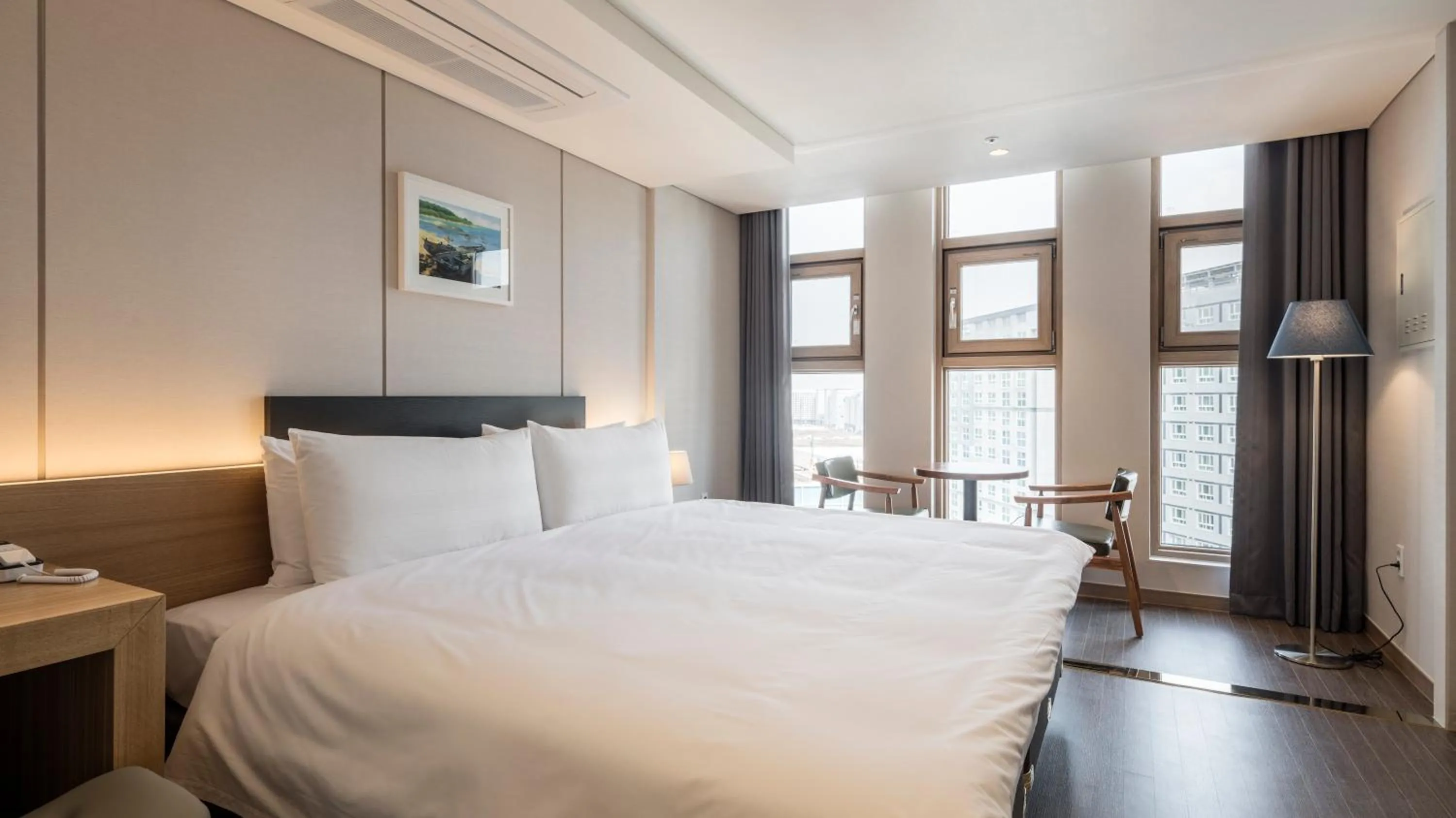 Bed in The First Stay Hotel