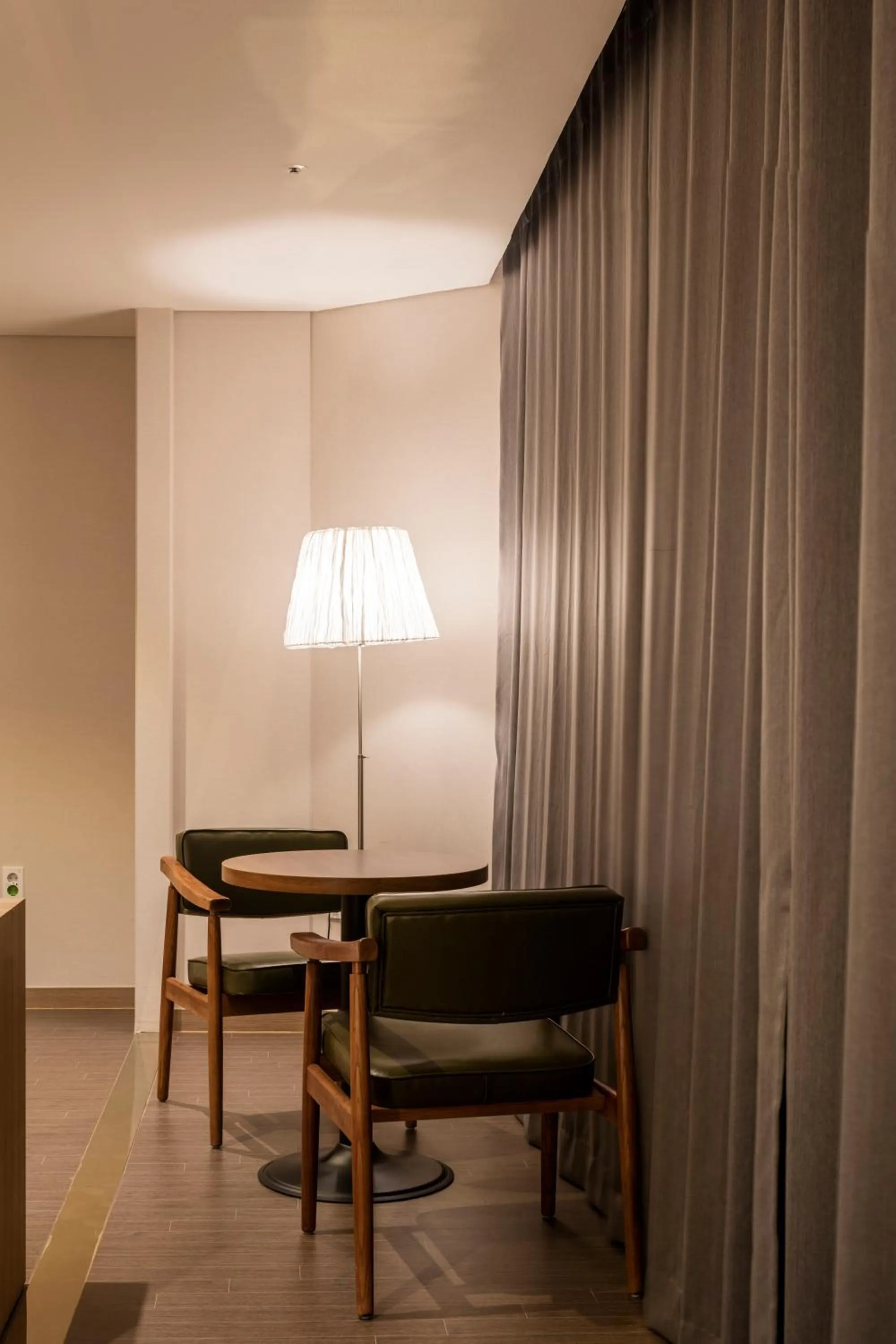 Seating area in The First Stay Hotel