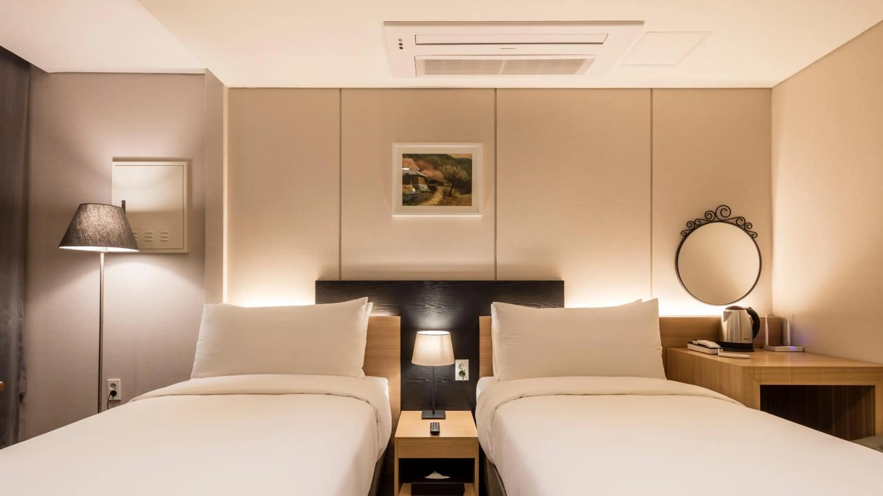 Bed in The First Stay Hotel