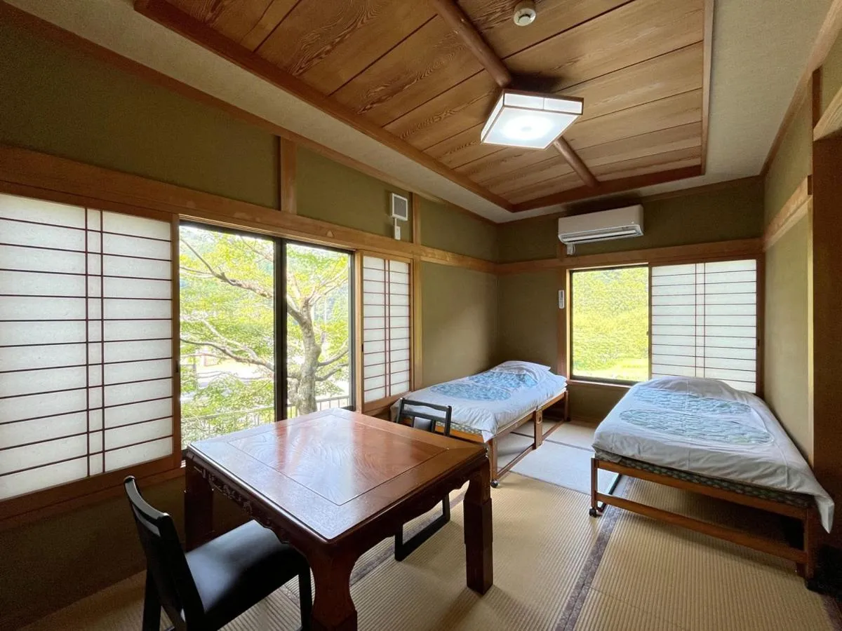 Bed in Minshuku Ryokan Kawai