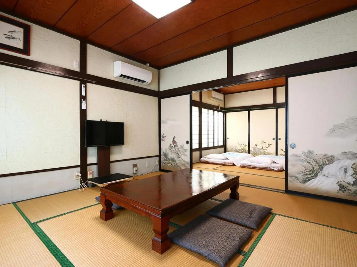 TV and multimedia, Bed in Minshuku Ryokan Kawai