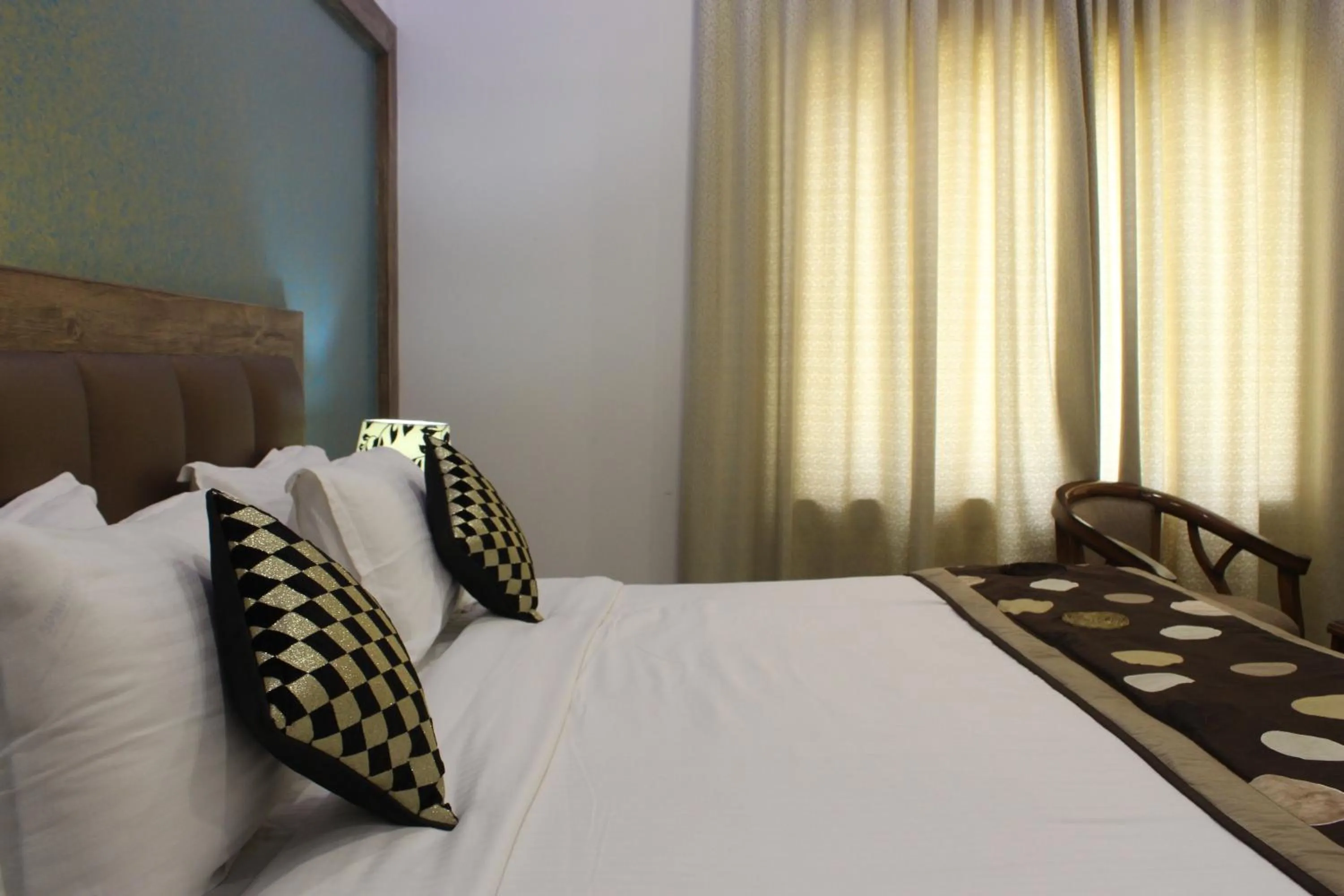 cot, Bed in Regal Hotel and restaurant