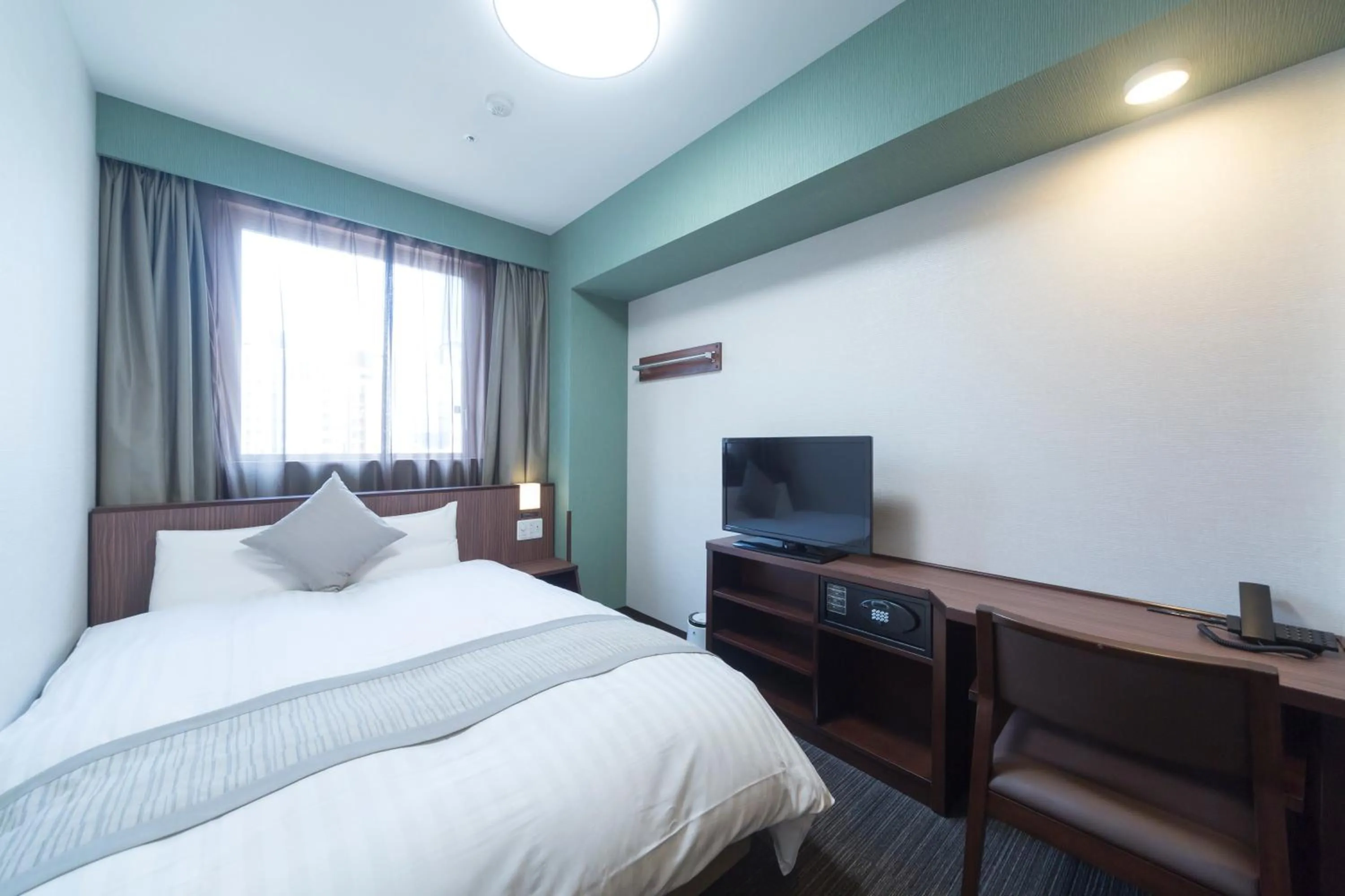 Bed in Dormy Inn Premium Kanda