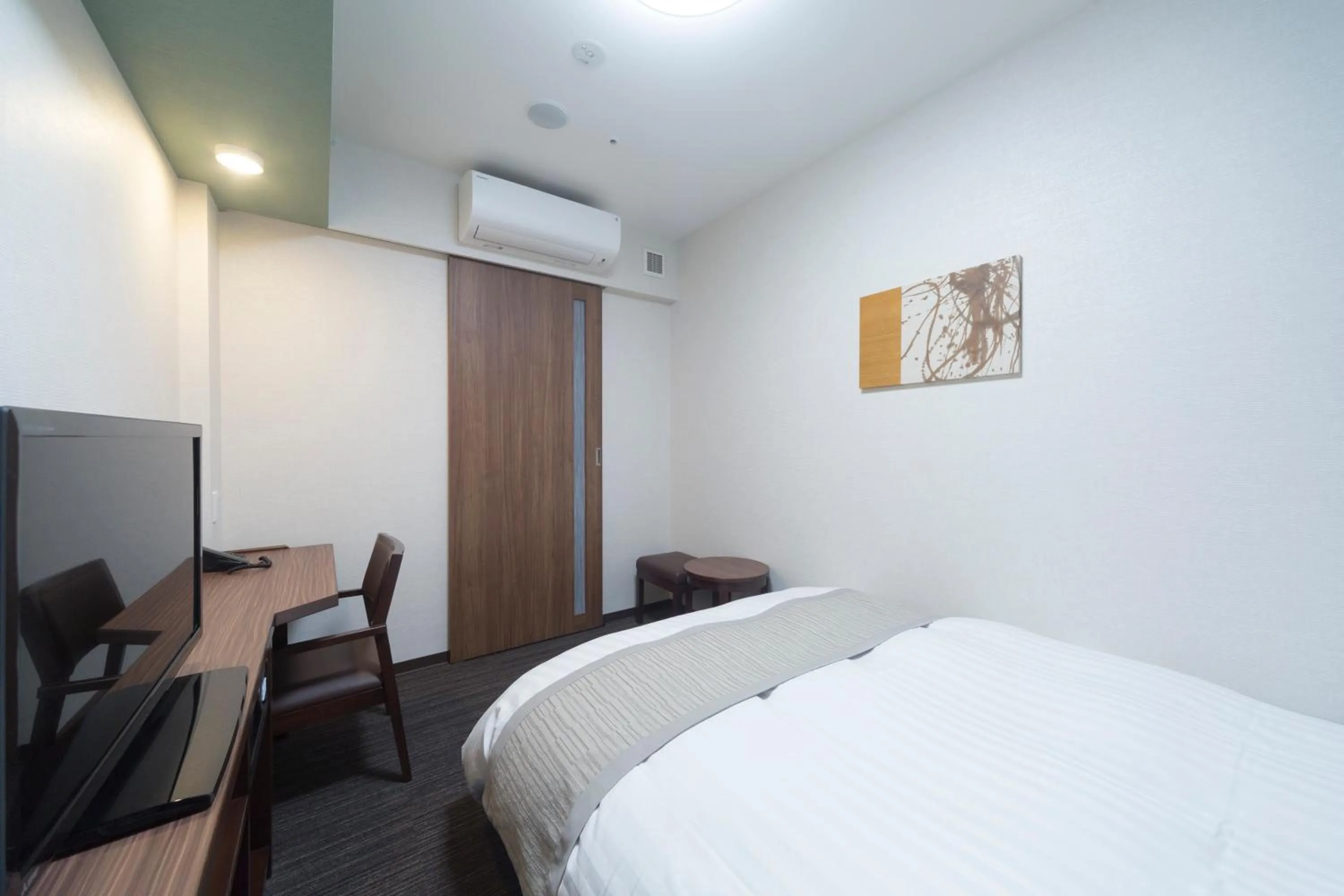 Bed in Dormy Inn Premium Kanda