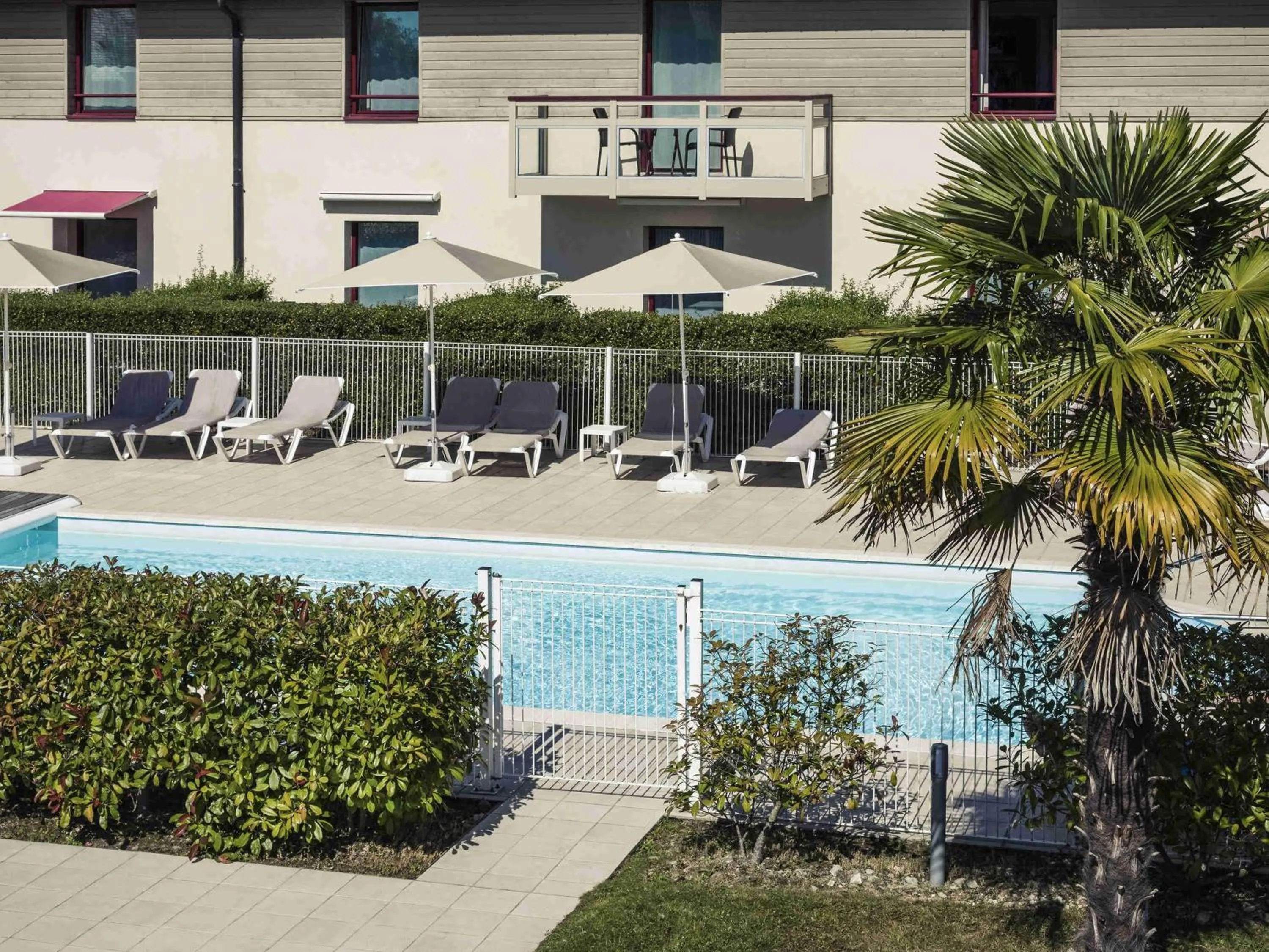 Pool view in Mercure Dinan Port Le Jerzual