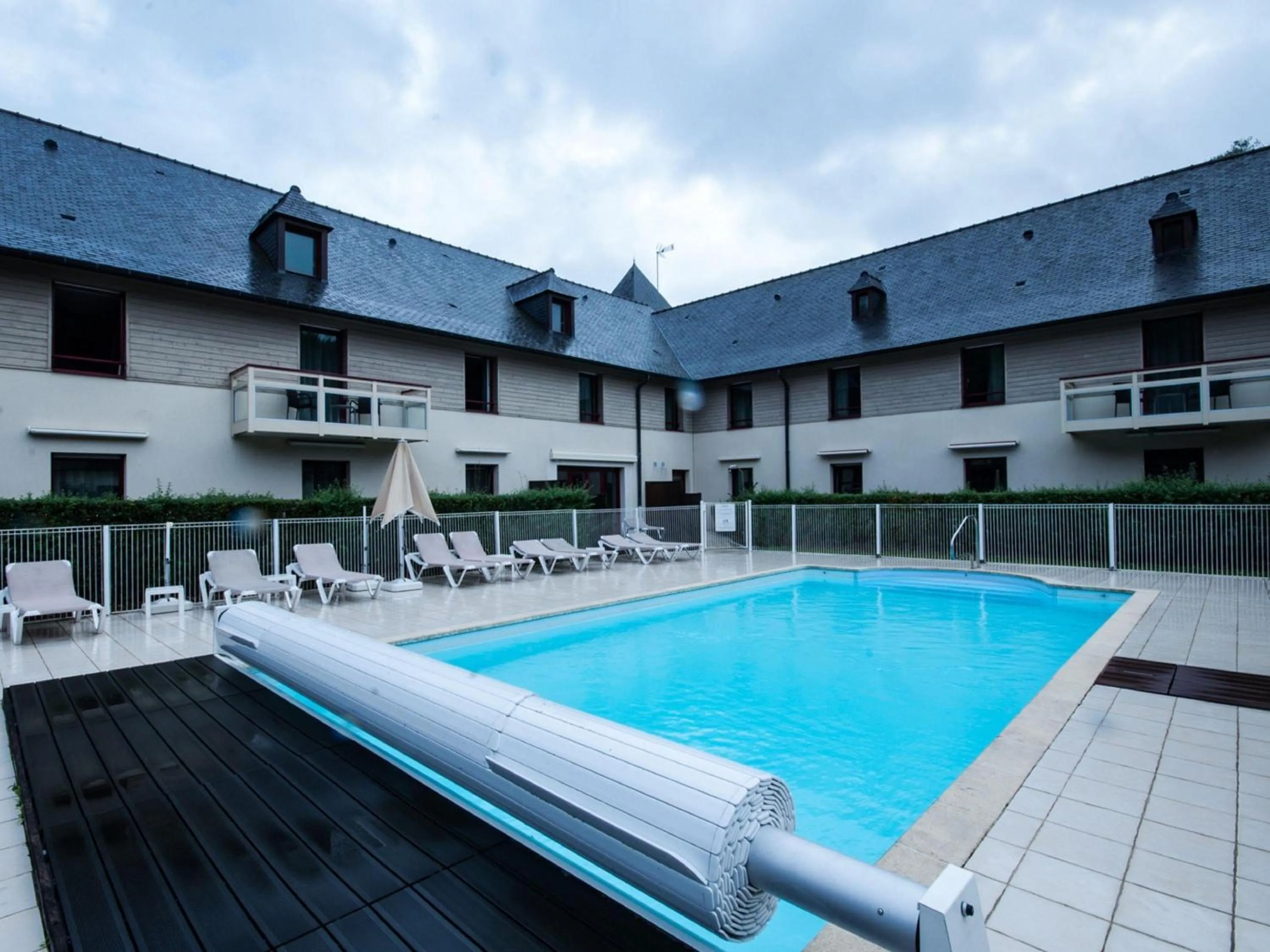 Pool view in Mercure Dinan Port Le Jerzual