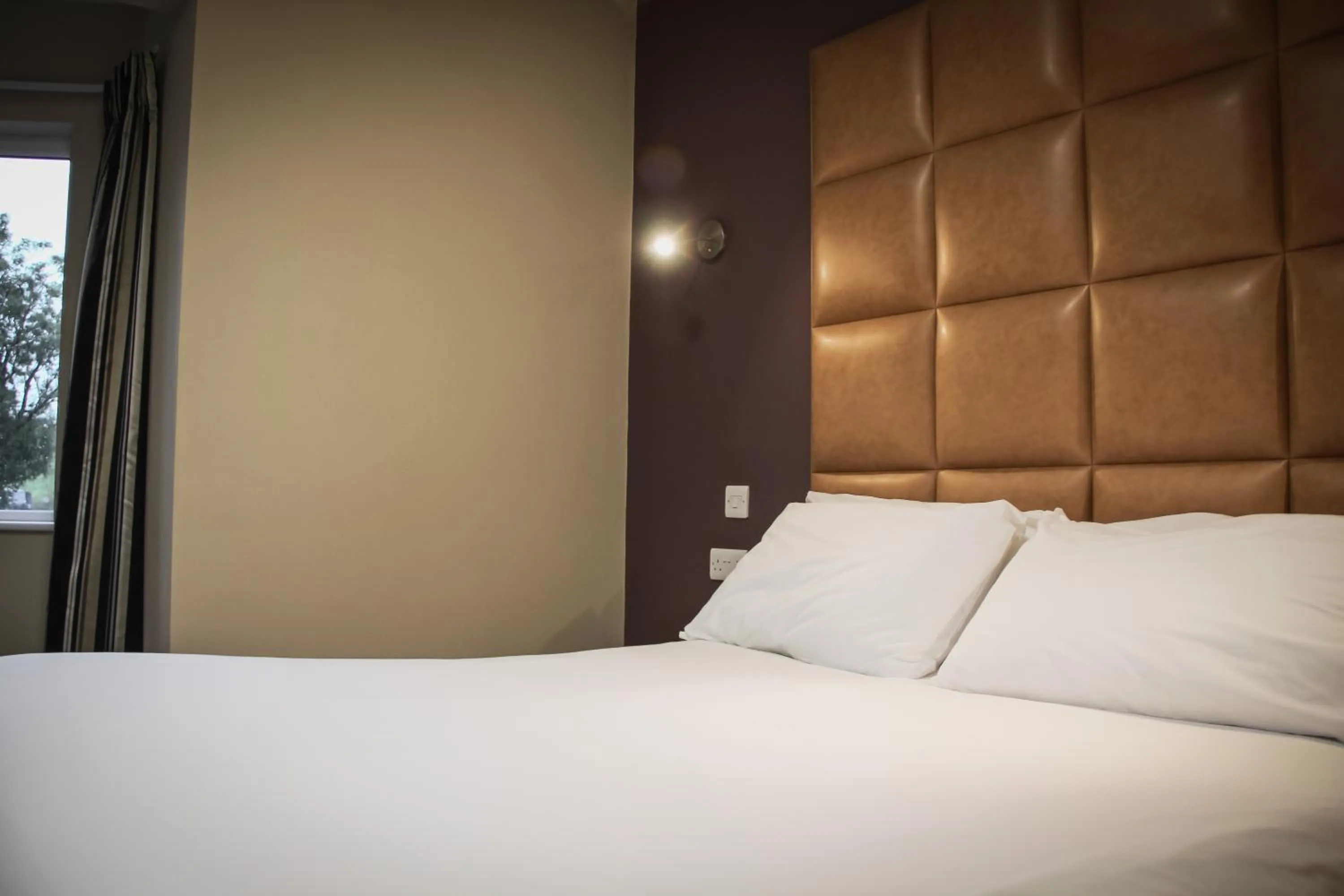 Bedroom, Bed in Skipton Hotel - formerly known as Hotel Rendezvous-Skipton