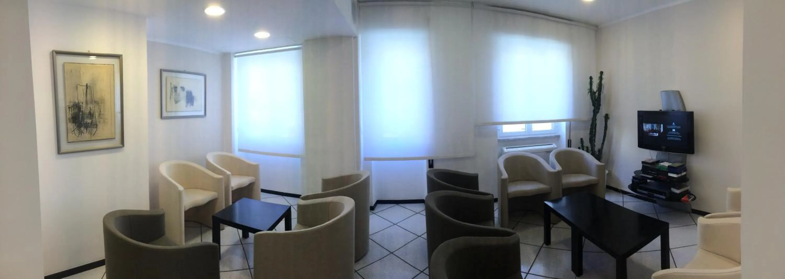 Communal lounge/ TV room in Hotel Al Capo