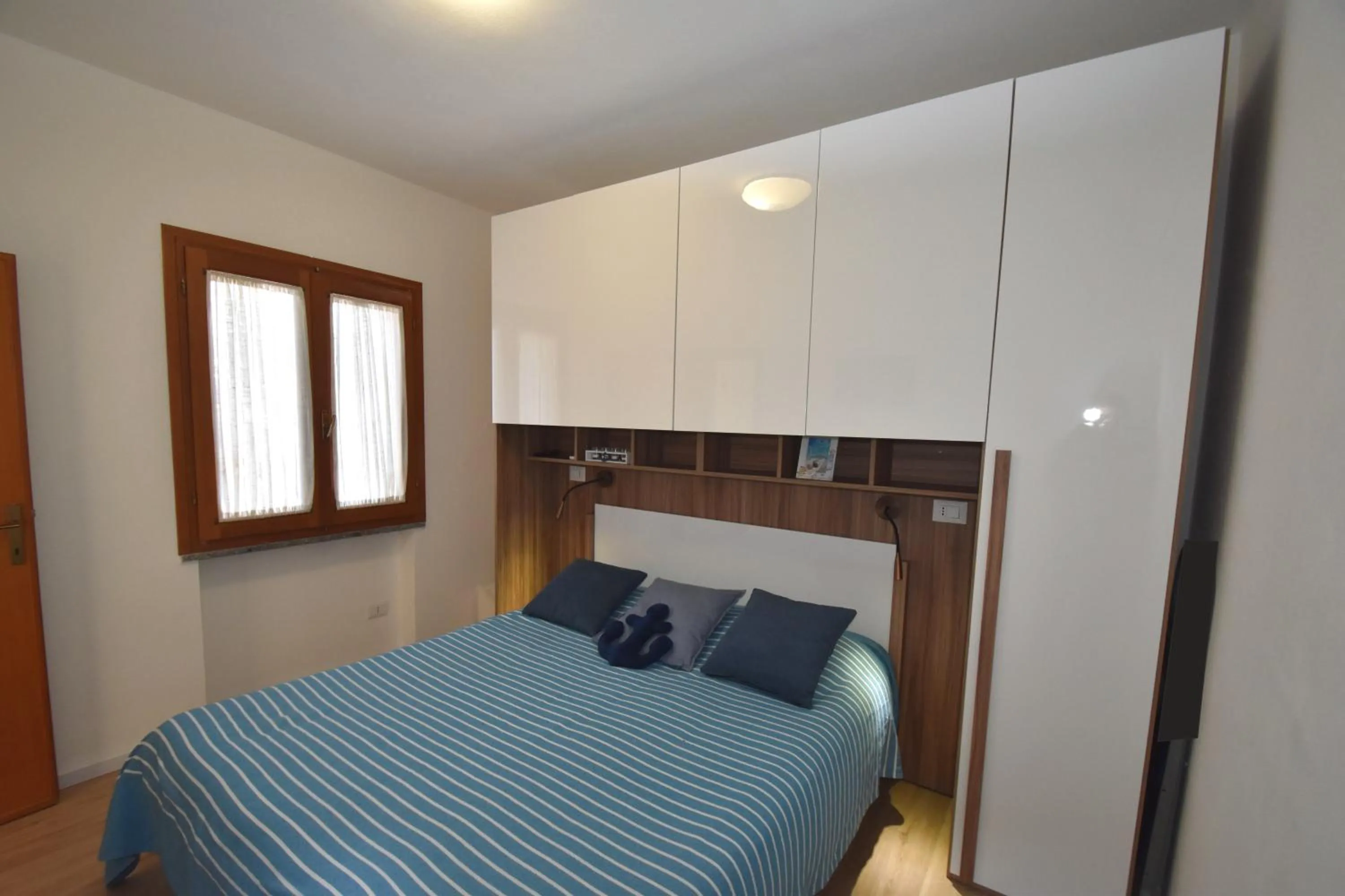 Bedroom, Bed in Appartamento Amapola - Bilocale in zona mare con clima e posto auto