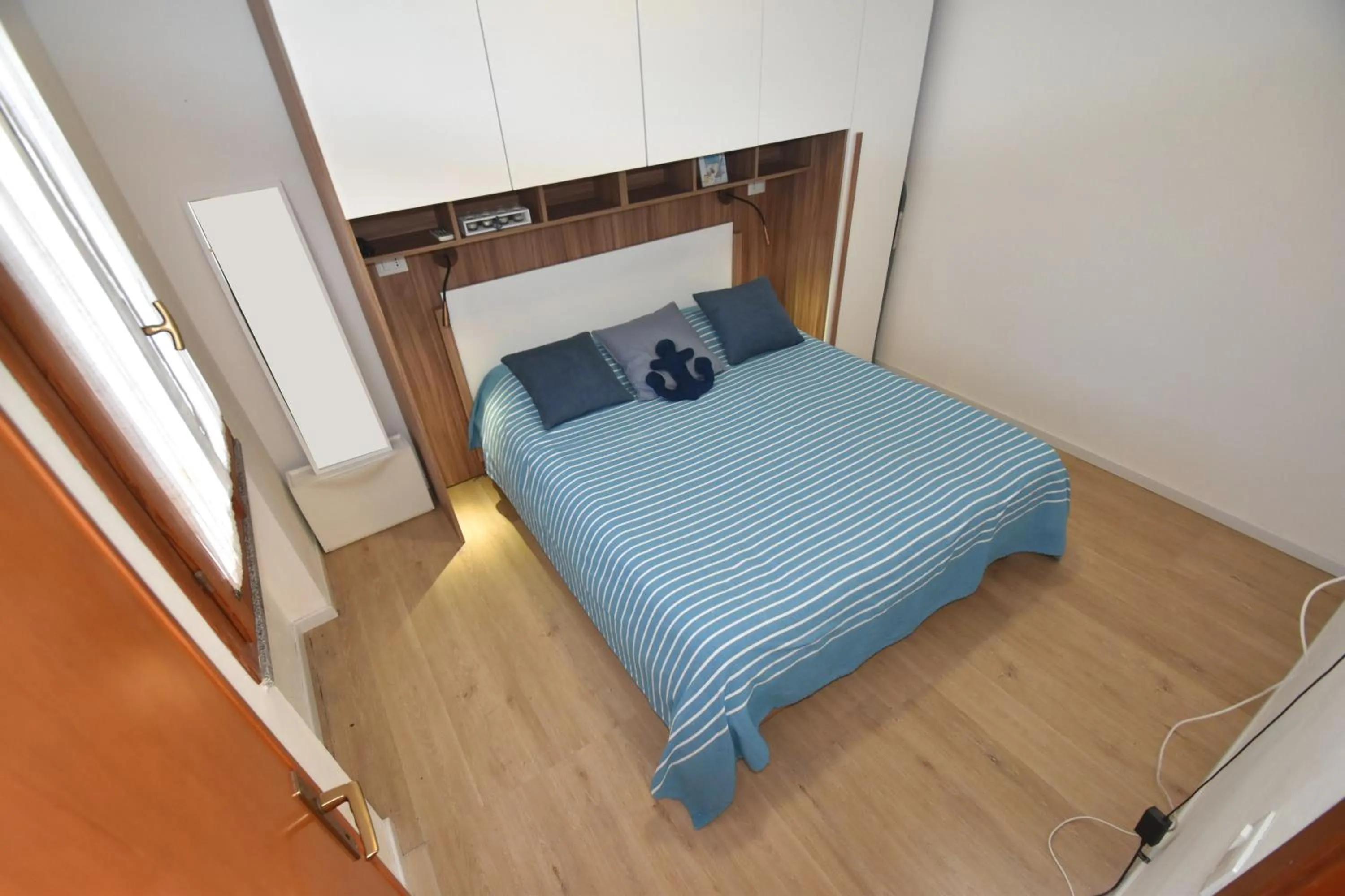 Bedroom, Bed in Appartamento Amapola - Bilocale in zona mare con clima e posto auto