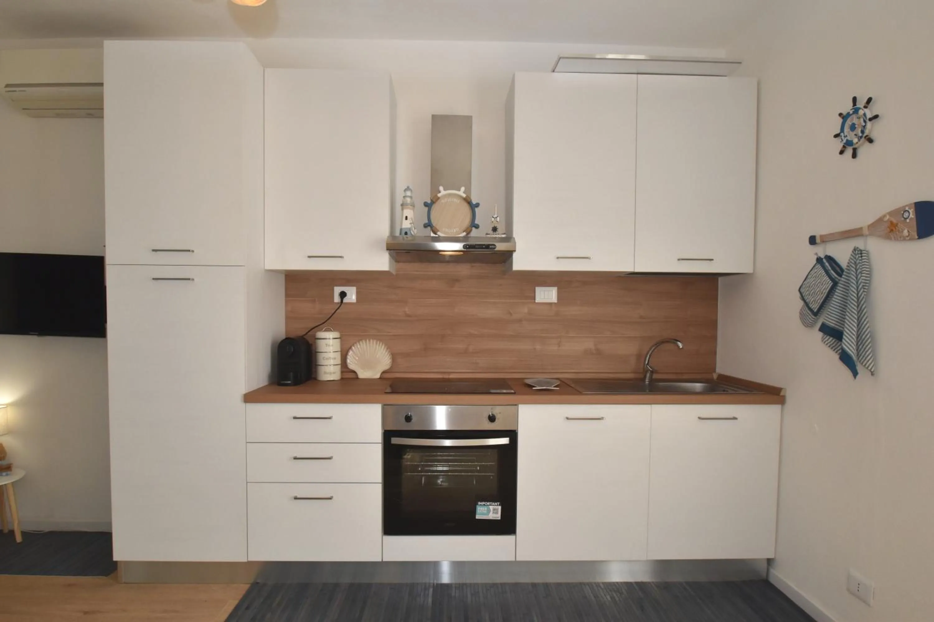 Kitchen or kitchenette in Appartamento Amapola - Bilocale in zona mare con clima e posto auto