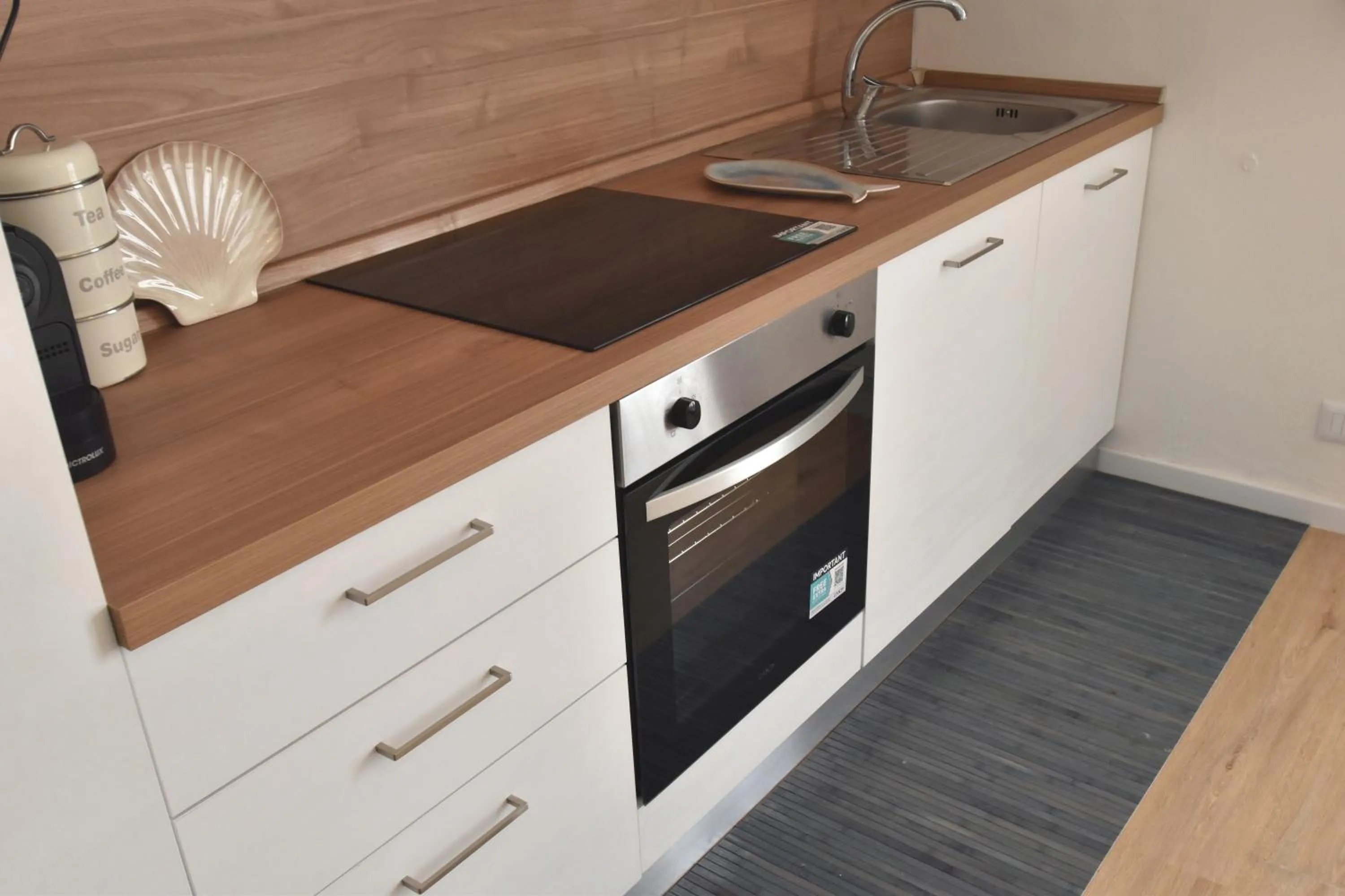 Kitchen or kitchenette in Appartamento Amapola - Bilocale in zona mare con clima e posto auto