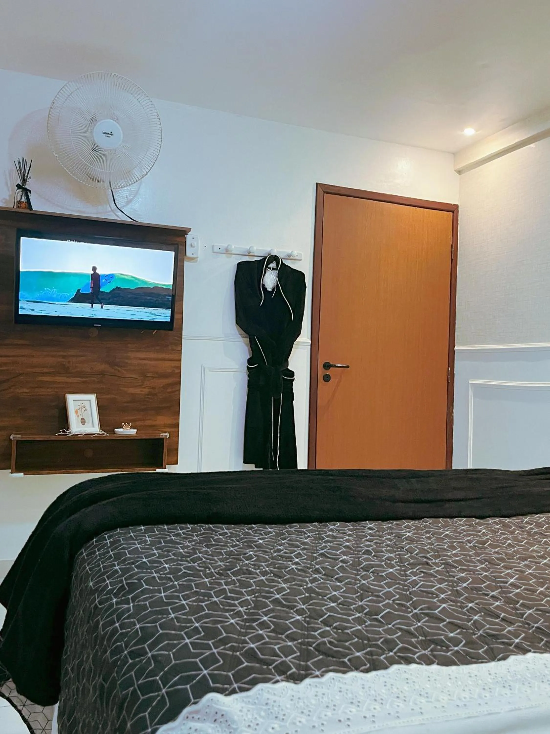 Bed in Pousada Recanto da Família