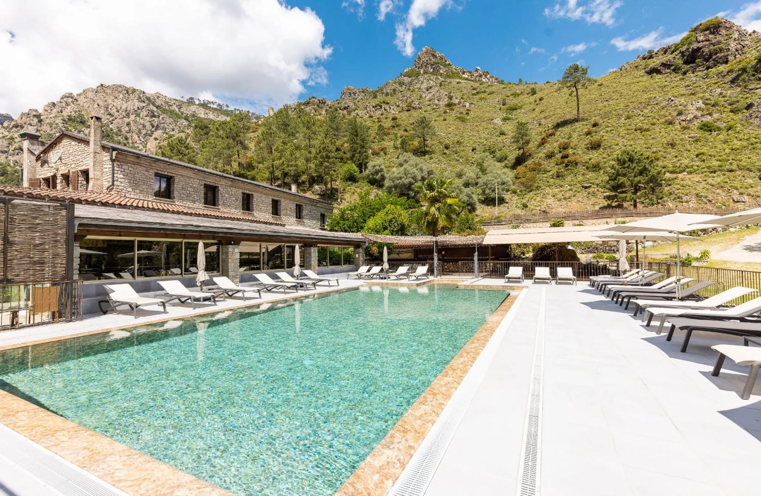 Swimming pool in Hôtel de la Restonica