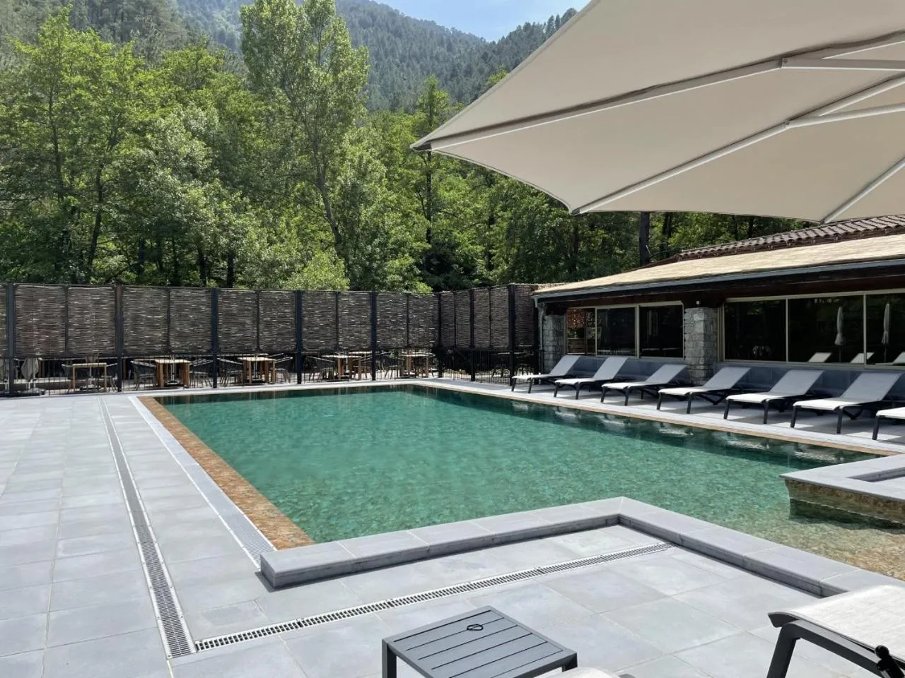 Swimming pool in Hôtel de la Restonica