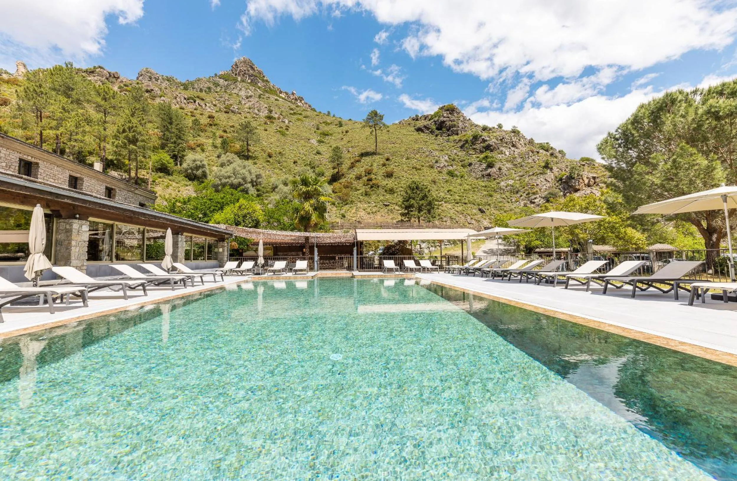 Swimming pool in Hôtel de la Restonica