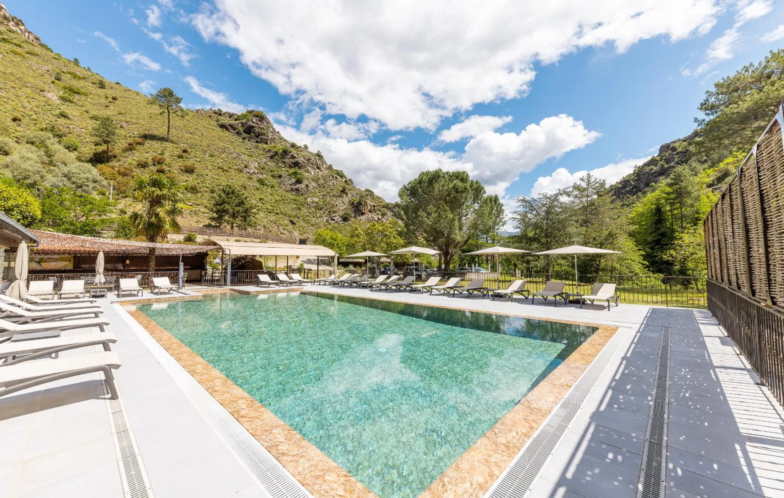 Swimming pool in Hôtel de la Restonica