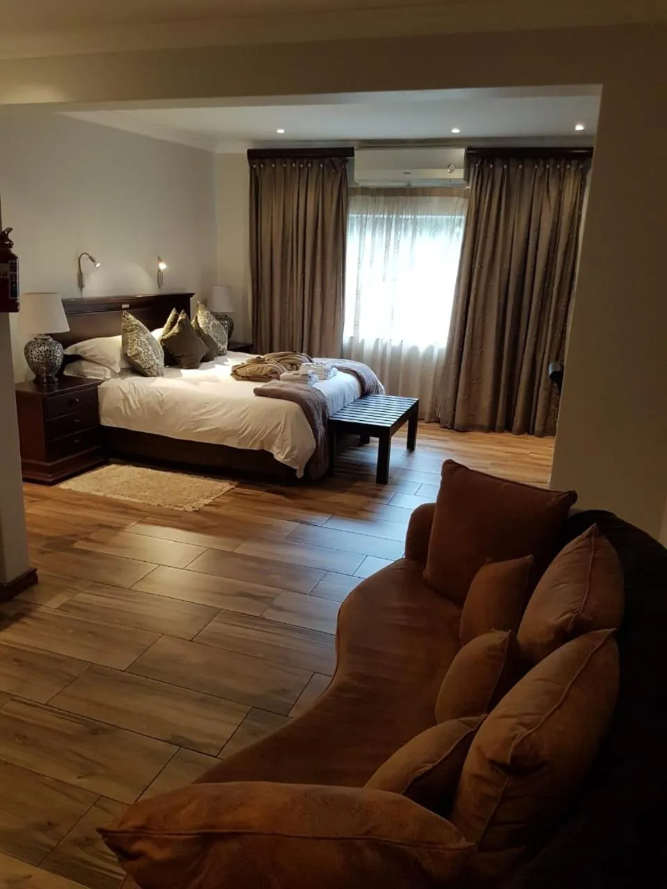 Photo of the whole room, Bed in Cornerstone Guest Lodge