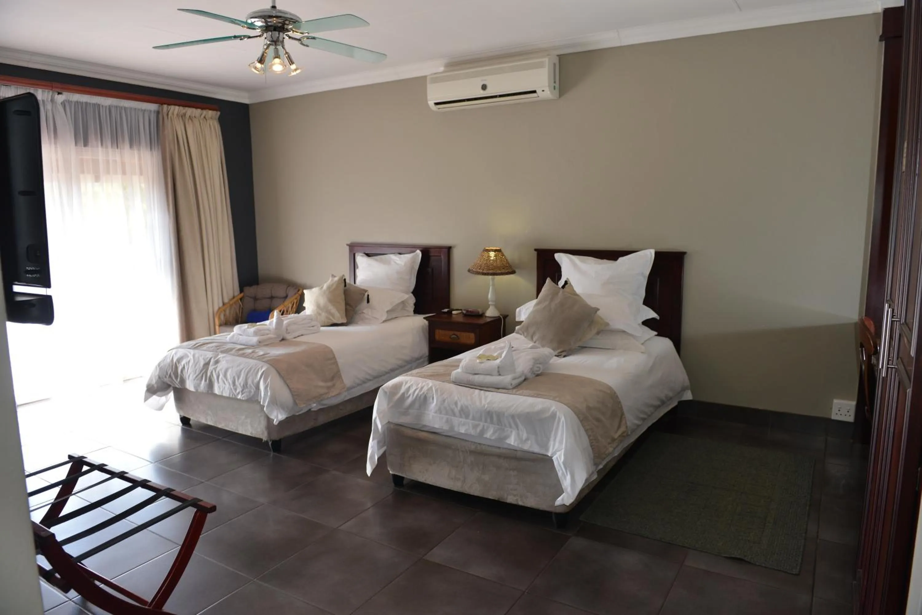 Bed in Cornerstone Guest Lodge
