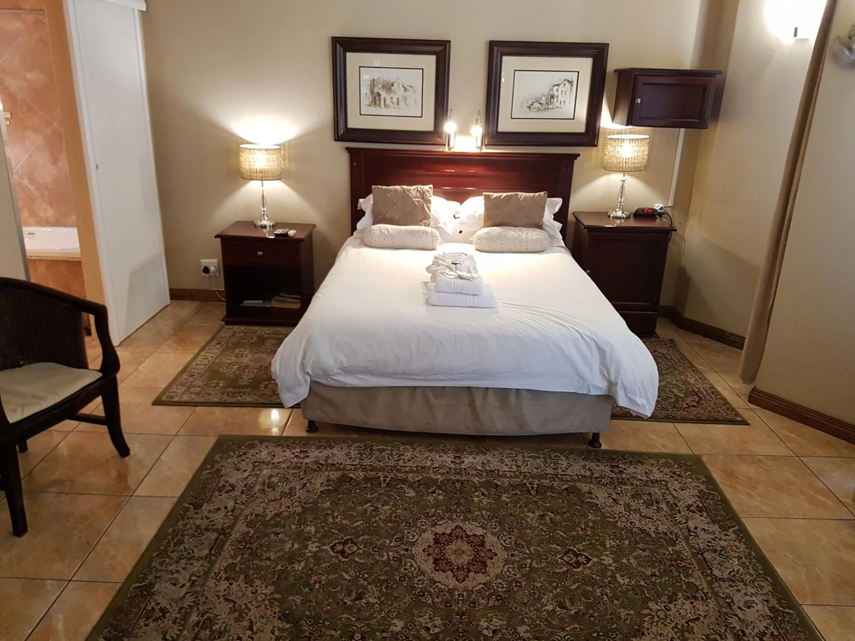 Bedroom, Bed in Cornerstone Guest Lodge