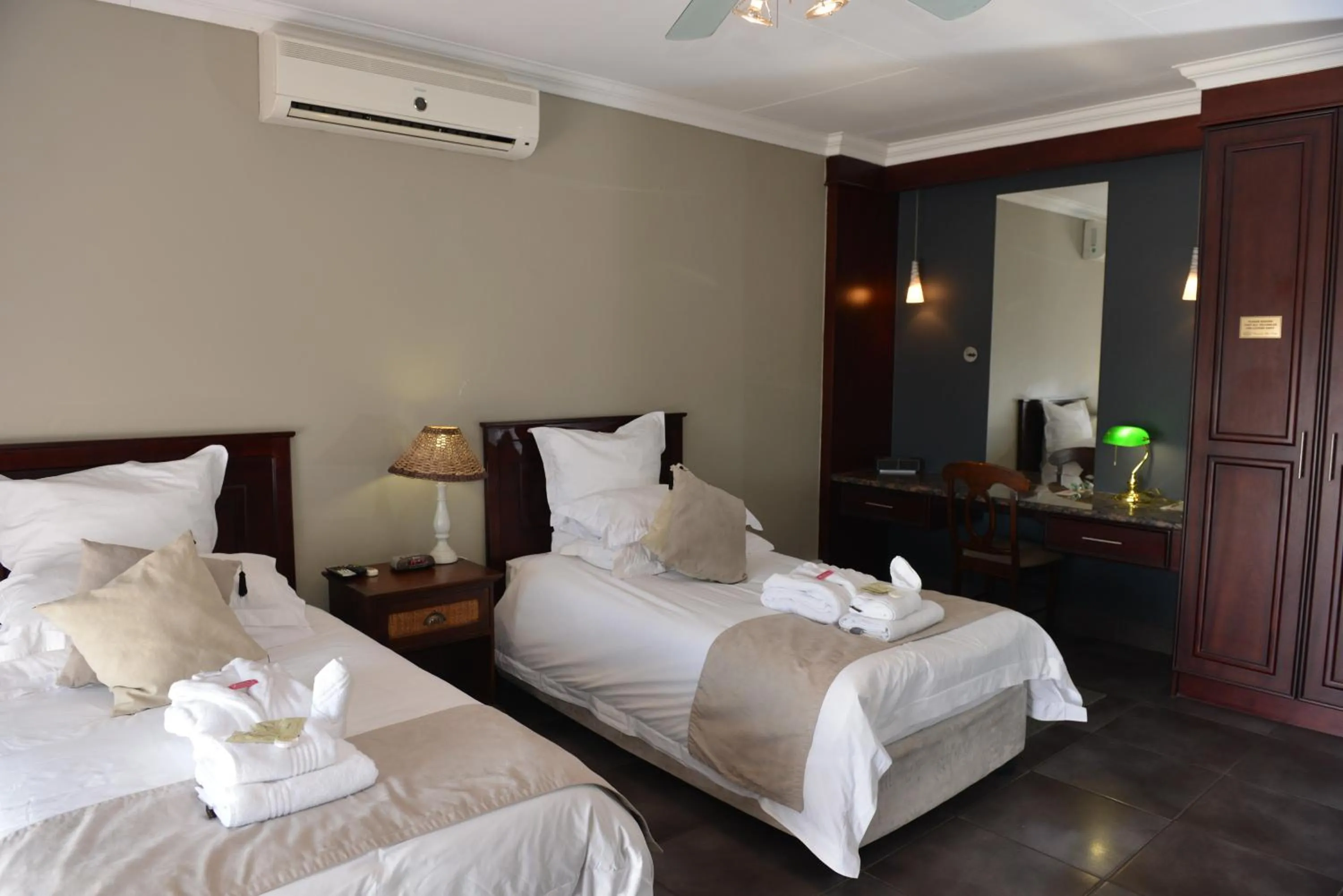 Bedroom, Bed in Cornerstone Guest Lodge