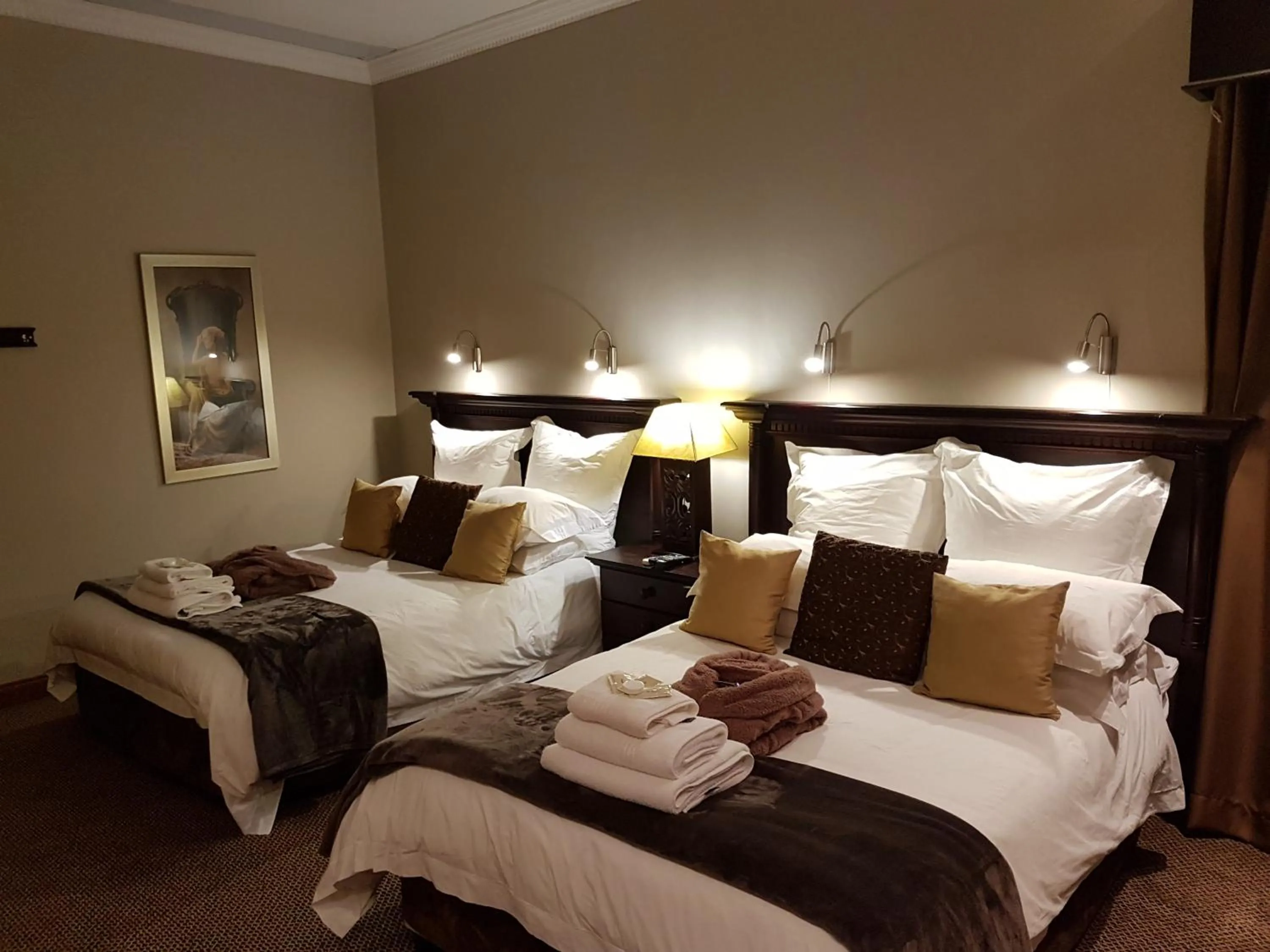 Bed in Cornerstone Guest Lodge