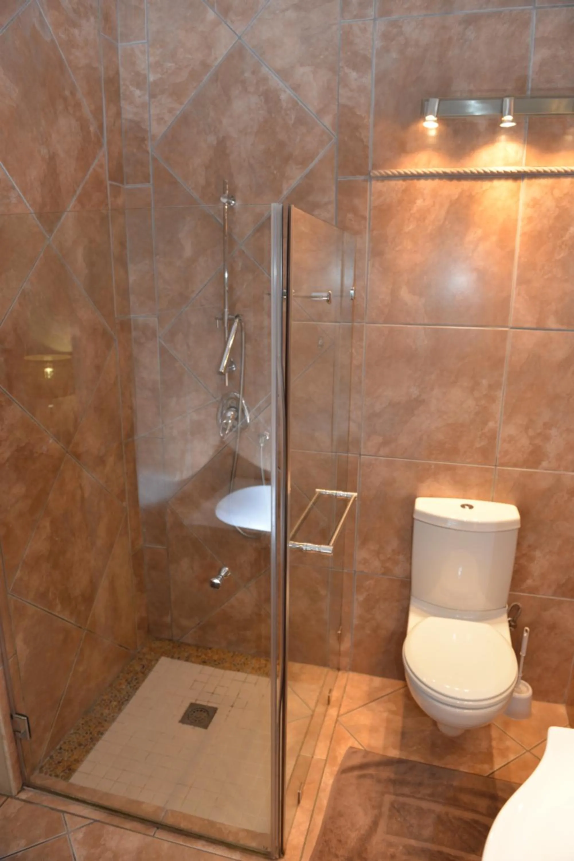 Shower in Cornerstone Guest Lodge