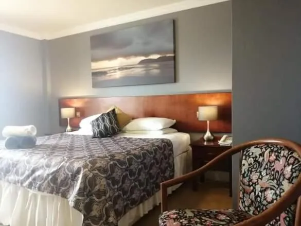 Bed in Three Rivers Hotel