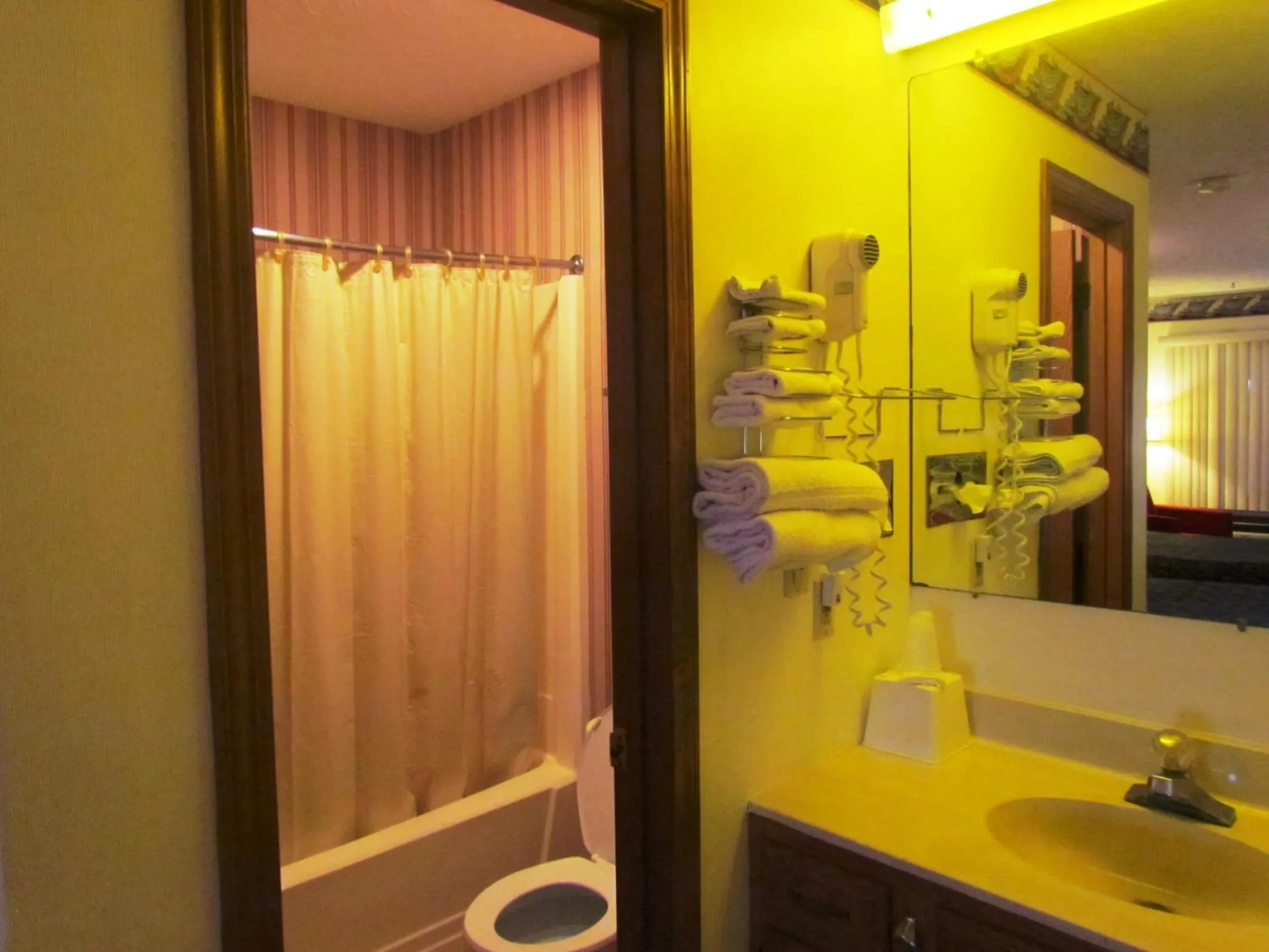 Bathroom in Travel Inn & Suites